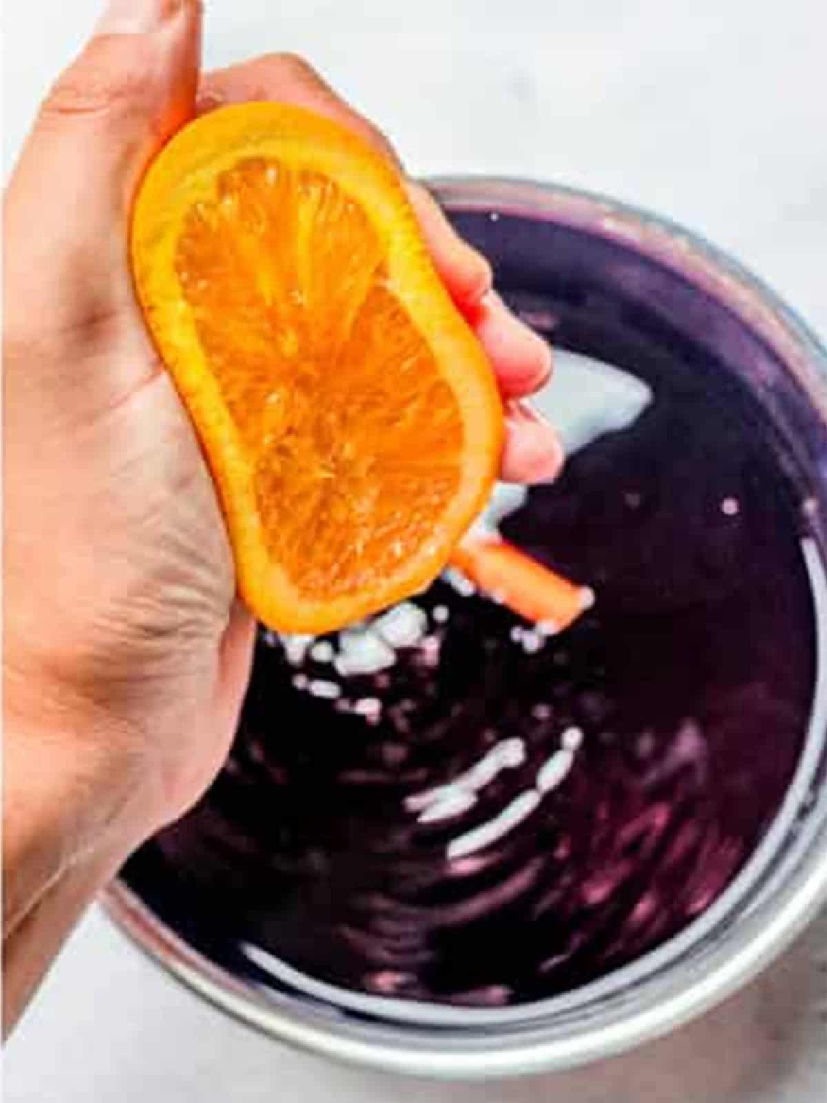 Orange juice squeezed into the red wine poaching liquid.