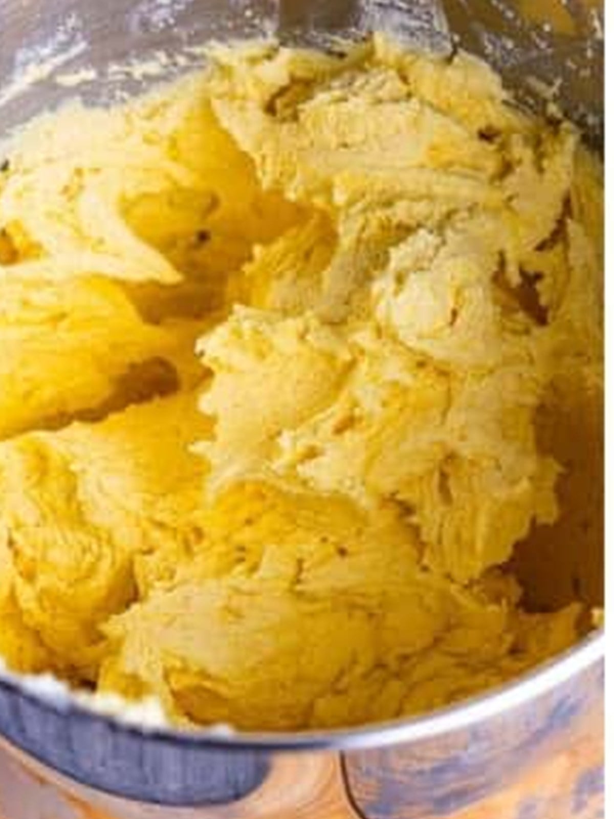 Creaming butter and sugar in a stand mixer until pale and fluffy