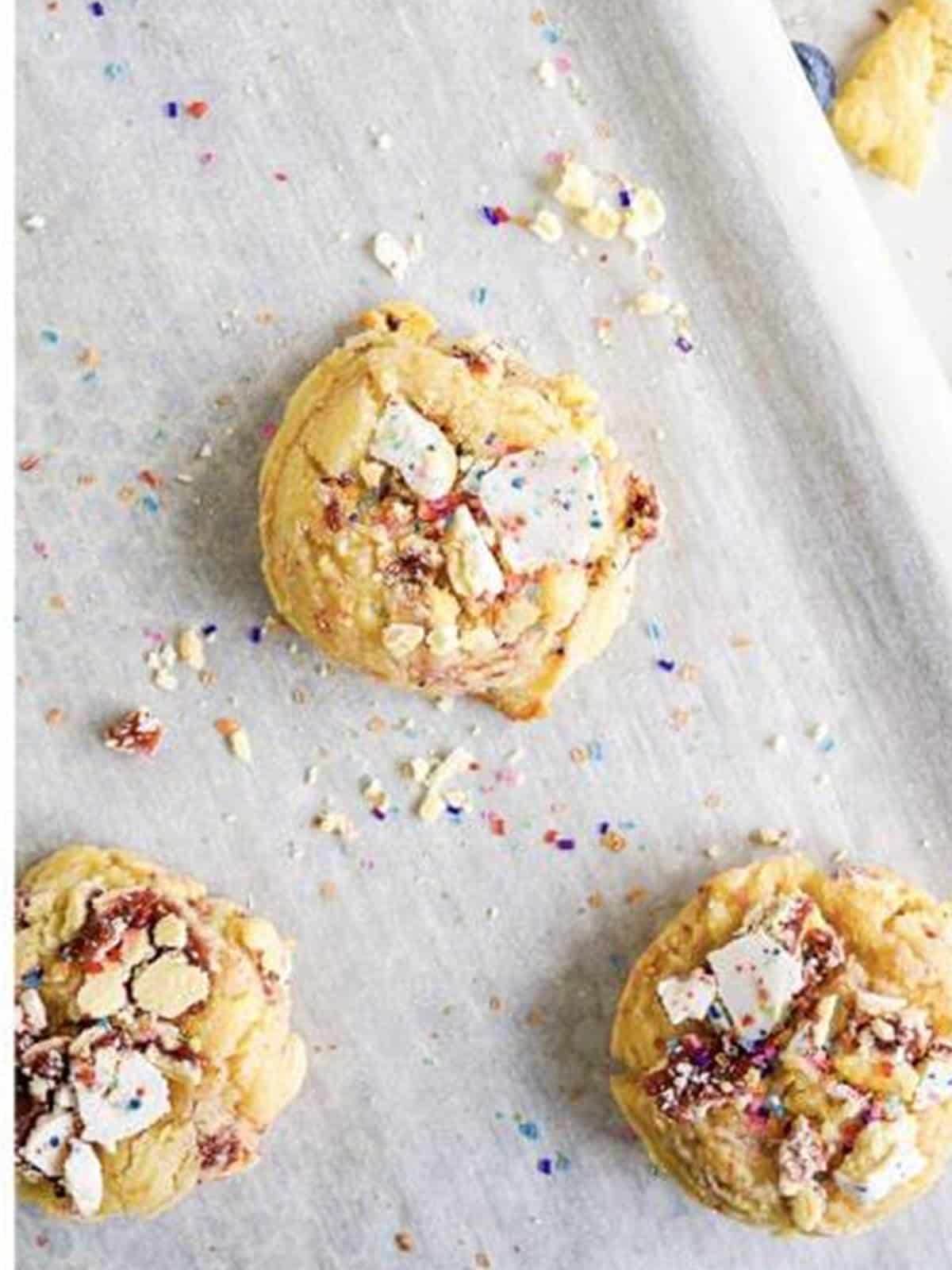 Baked pop tart sugar cookies topped with crushed Pop-Tarts and sprinkles.