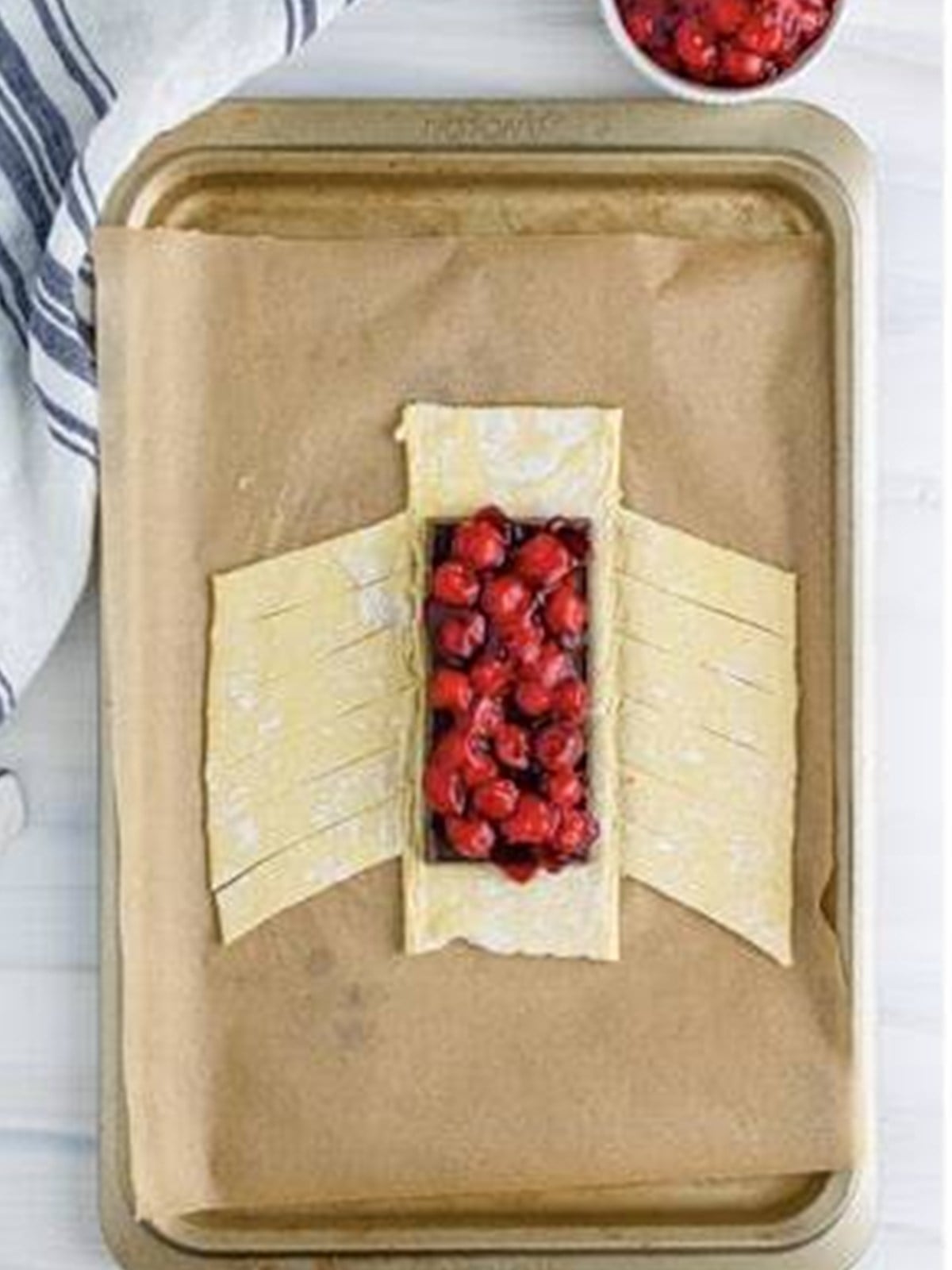 Cherry pie filling spooned over the chocolate on the puff pastry.