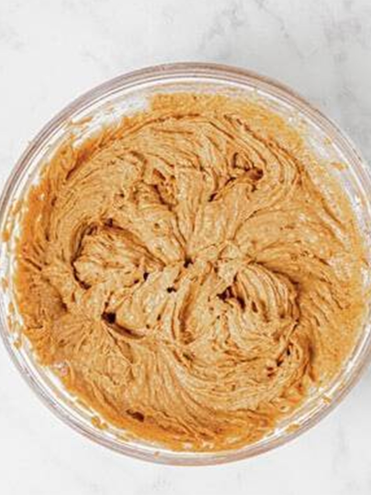 Creamed butter, sugar, and eggs for pumpkin bread