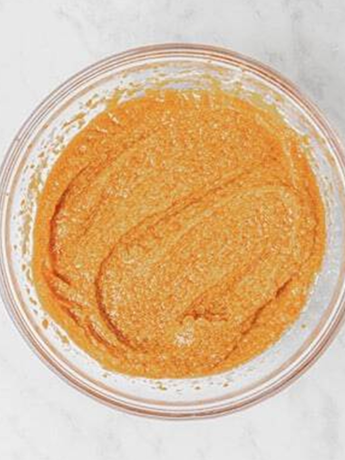 Pumpkin puree mixed into pumpkin bread batter