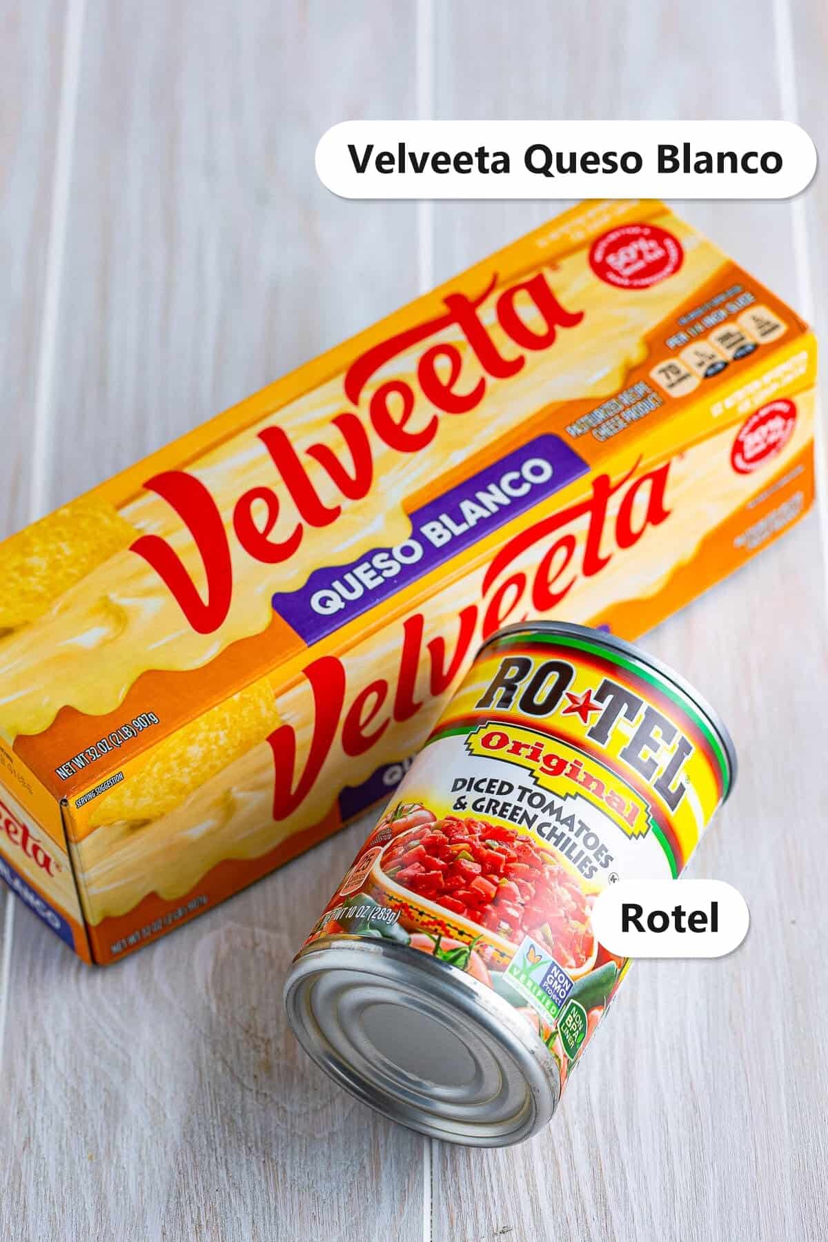 Labeled ingredients to make queso dip including Velveeta Queso Blanco and a can of Rotel diced tomatoes and green chilies.