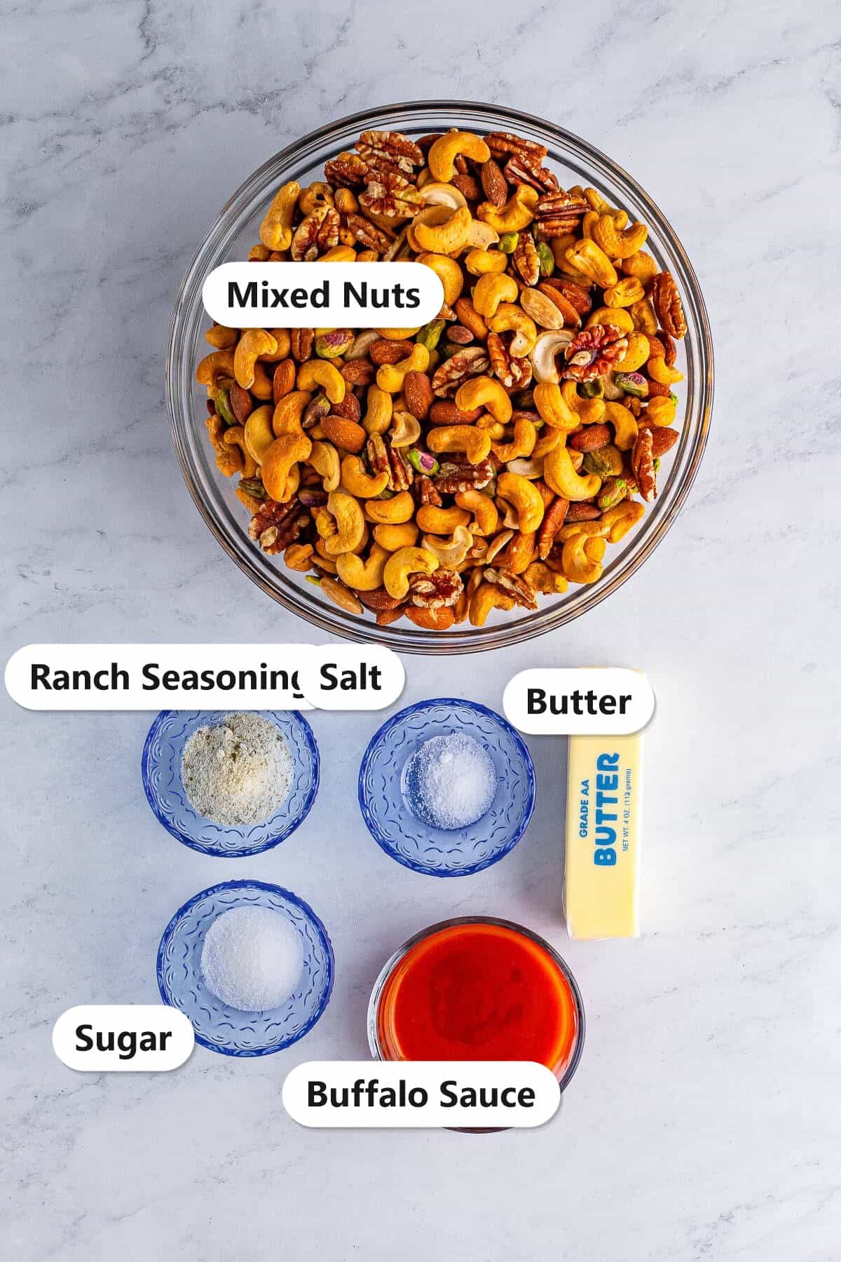 Labeled buffalo ranch roasted nuts ingredients including mixed nuts, butter, buffalo sauce, ranch seasoning, sugar, and salt.