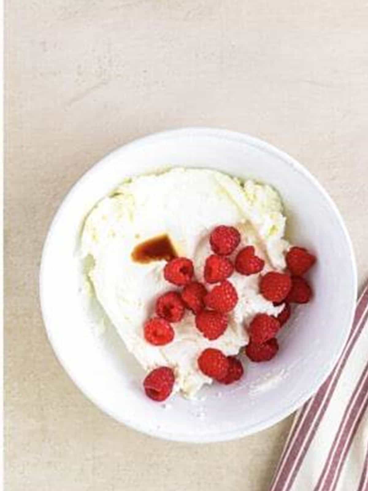 Whipped butter with powdered sugar, fresh raspberries, and vanilla for the buttercream.