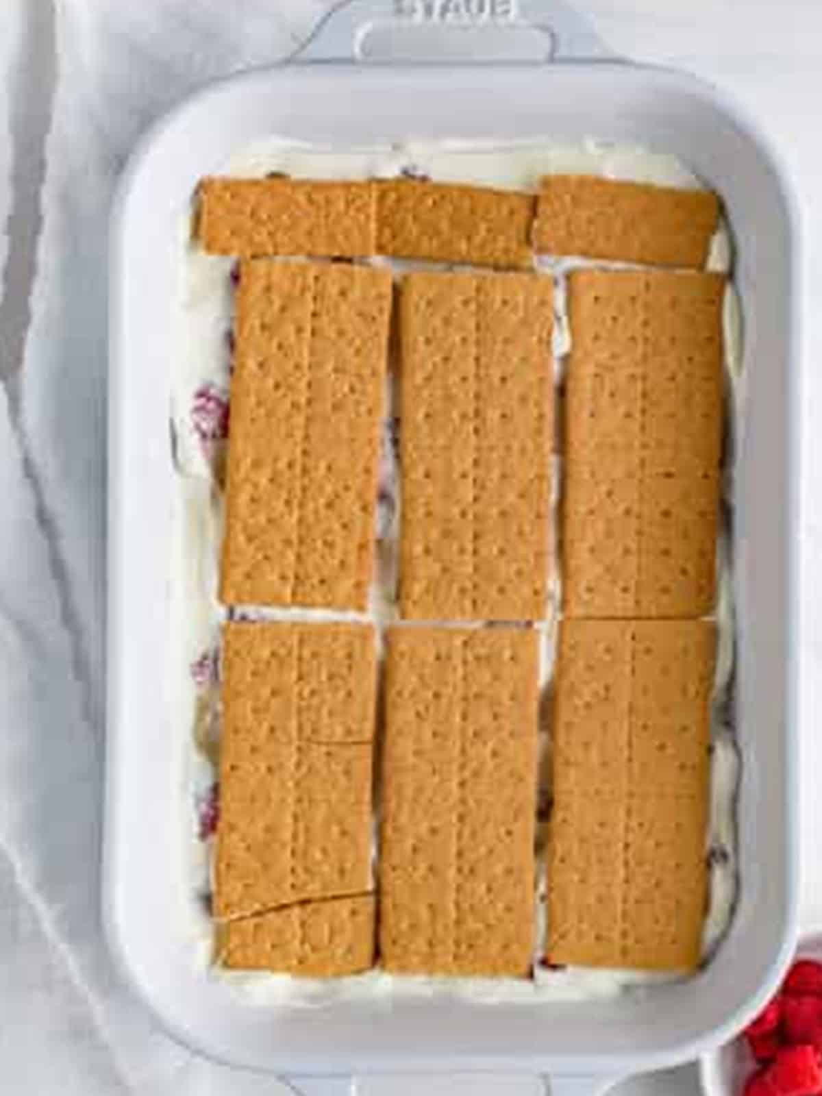 Second layer of graham crackers added to the Raspberry Icebox Cake.
