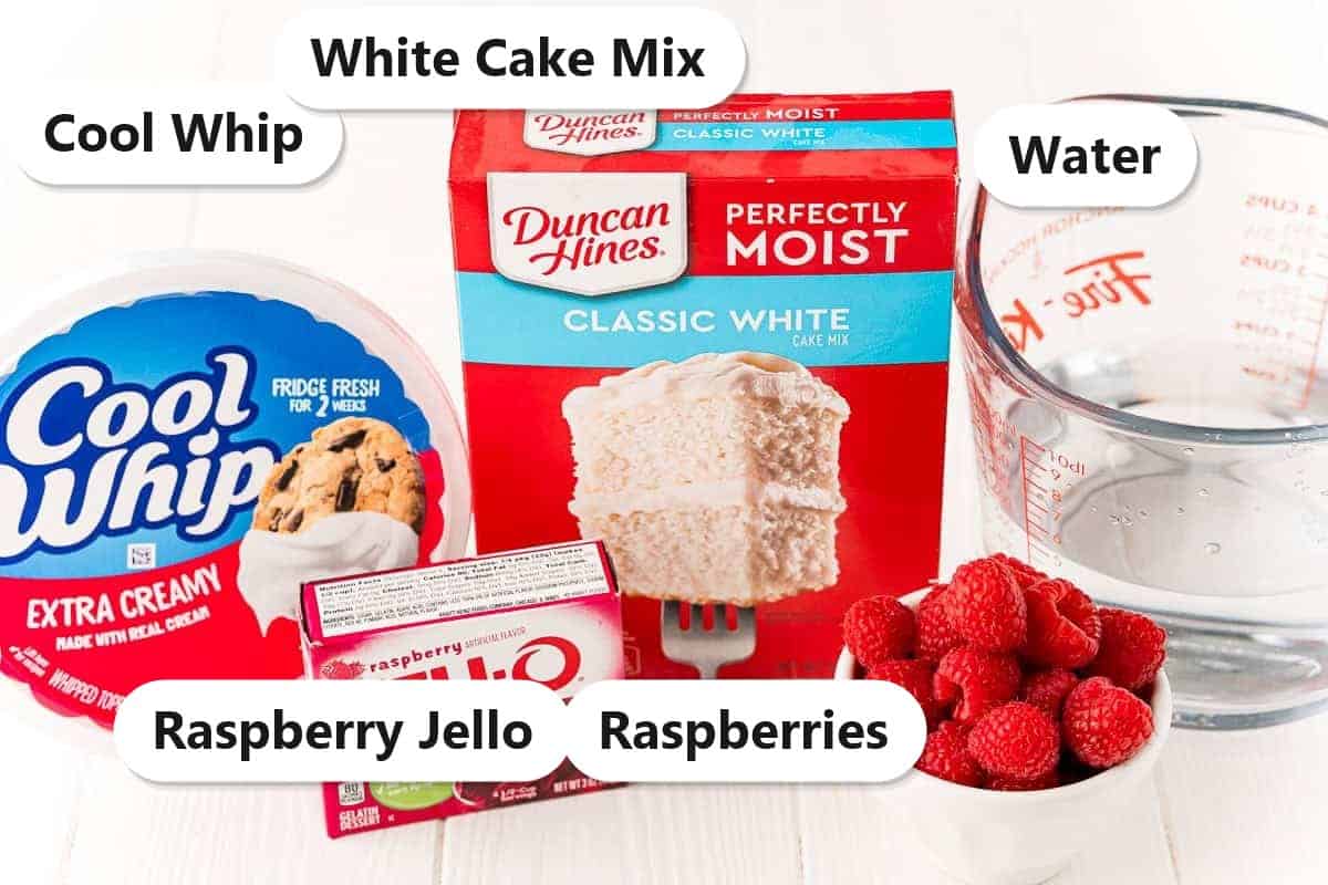 Labeled ingredient flatlay for Raspberry Poke Cake showing white cake mix, raspberry Jello, Cool Whip, fresh raspberries, and water.