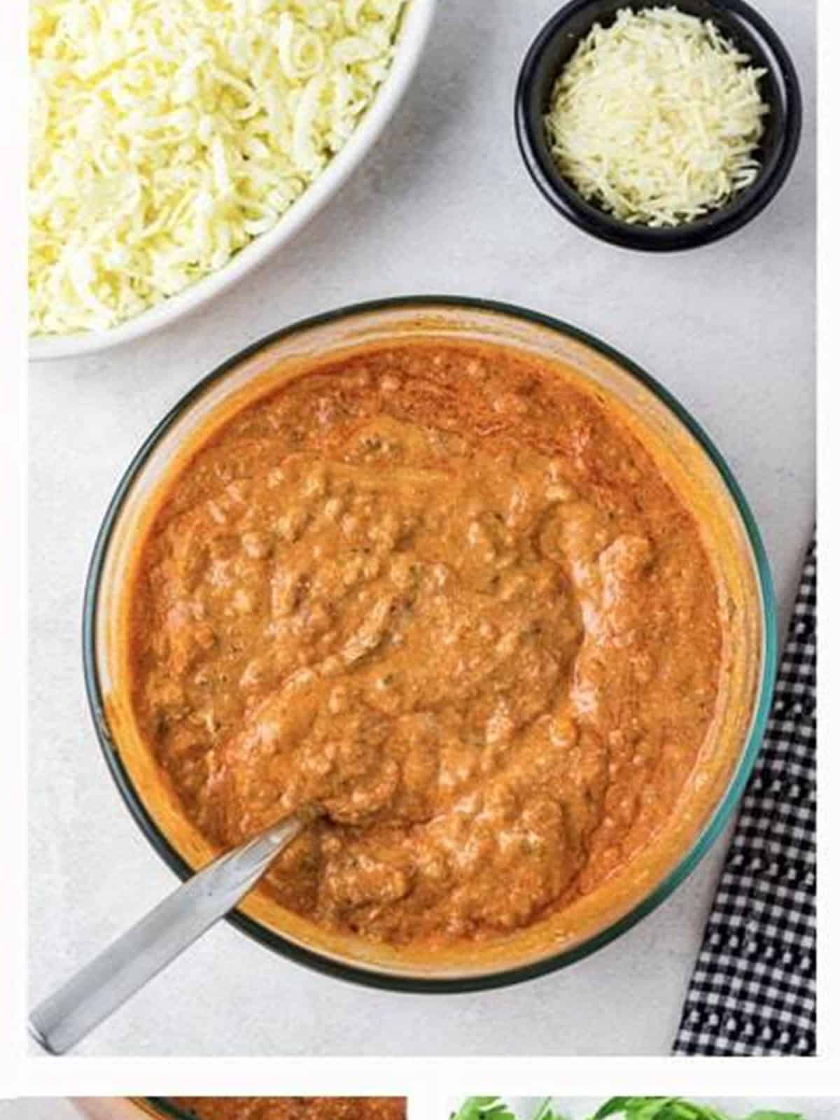 Meat sauce and ricotta mixed together until creamy in a bowl.