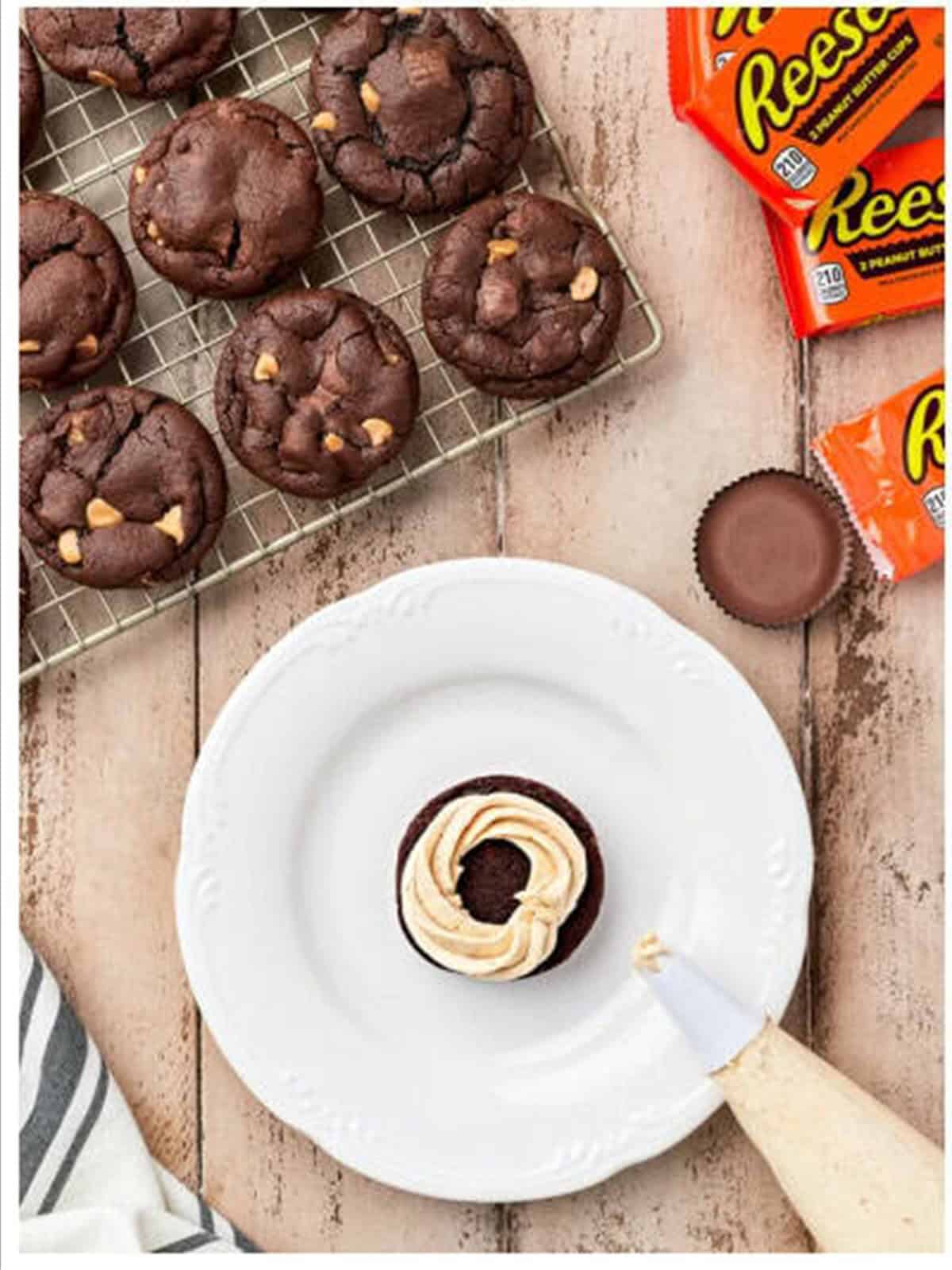 Baked chocolate cookies with Reeses cups.