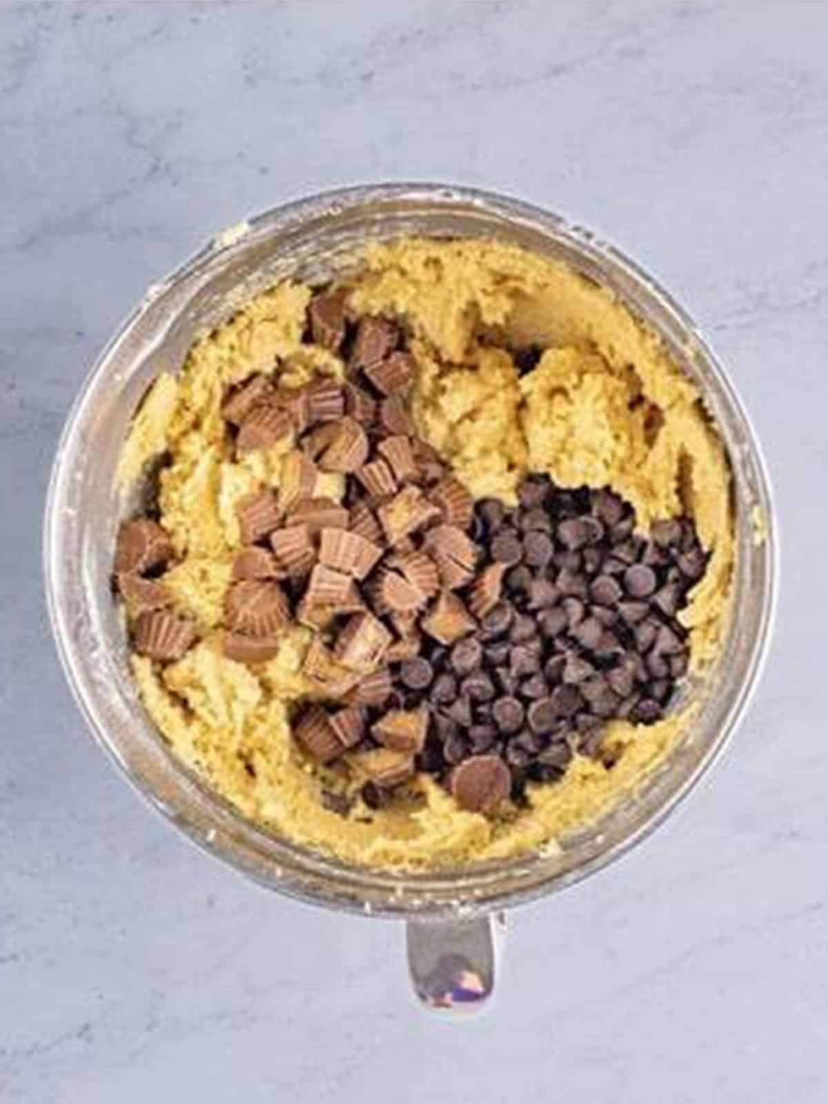 Chopped mini Reese's peanut butter cups and chocolate chips added to the dough.