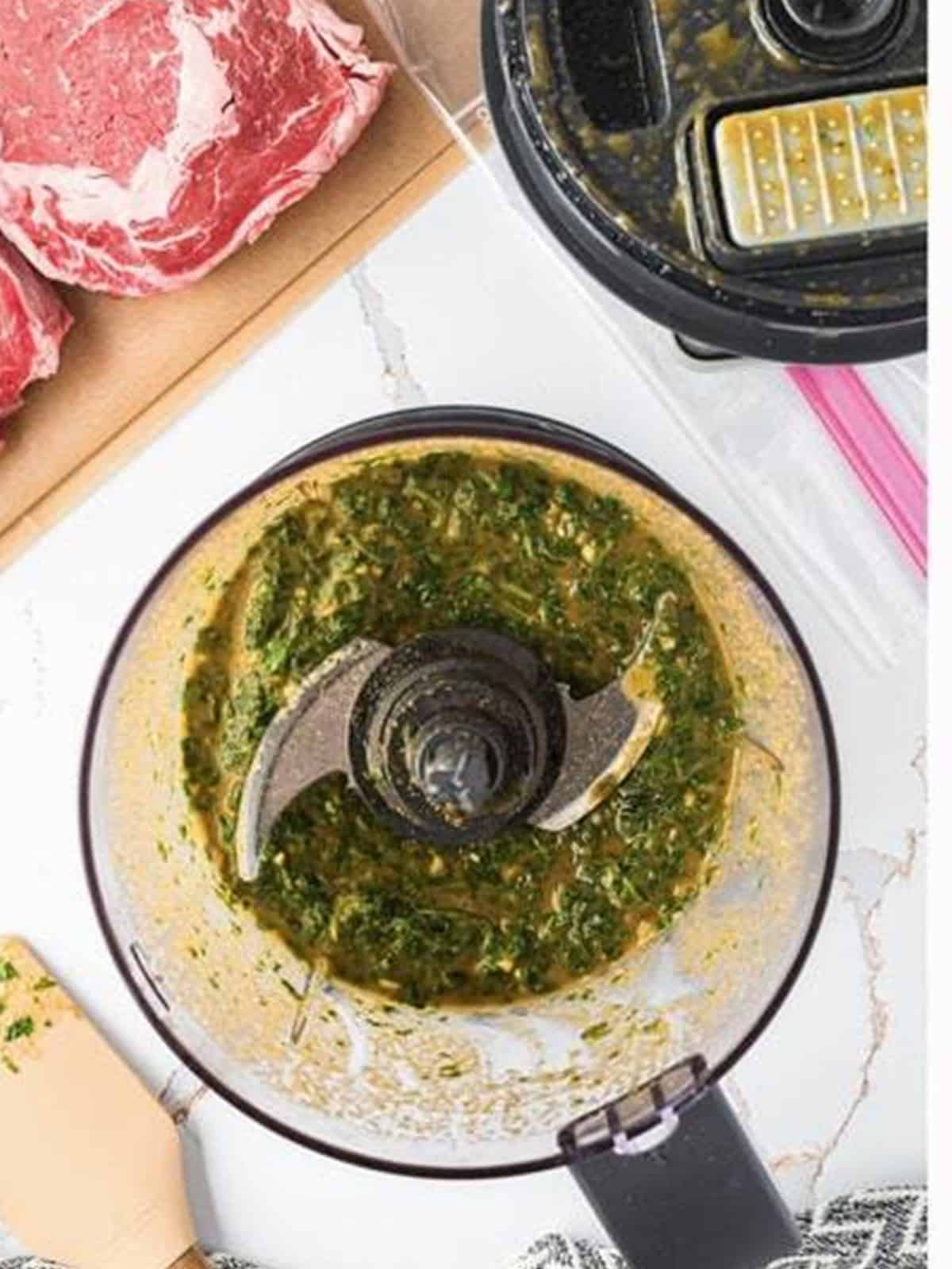 Pureed cilantro lime marinade in a food processor.