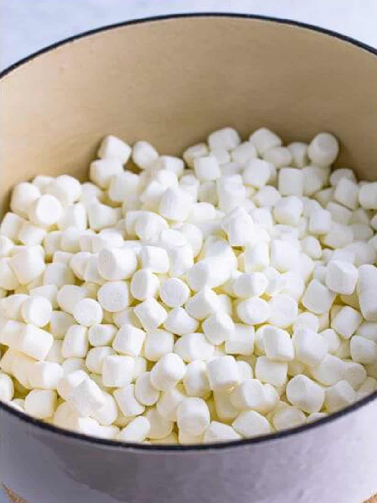 Mini marshmallows added to the melted butter for Rice Krispie Treats.