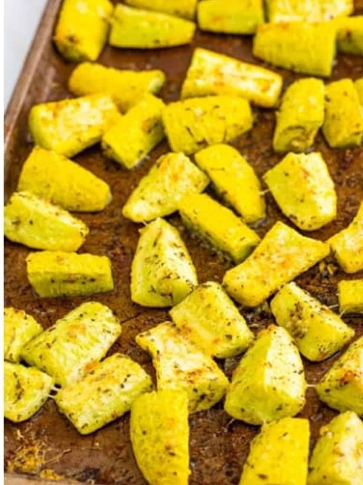Roasted yellow squash flipped on the sheet tray and topped with remaining parmesan.