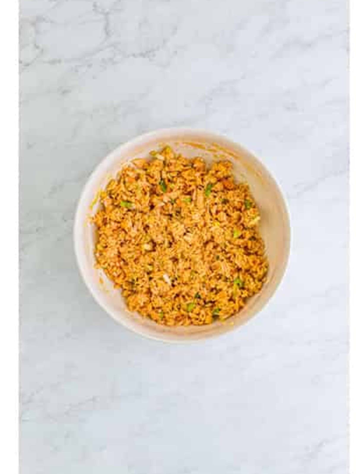 Salmon patties recipe mixture mixed together until well combined in a bowl.