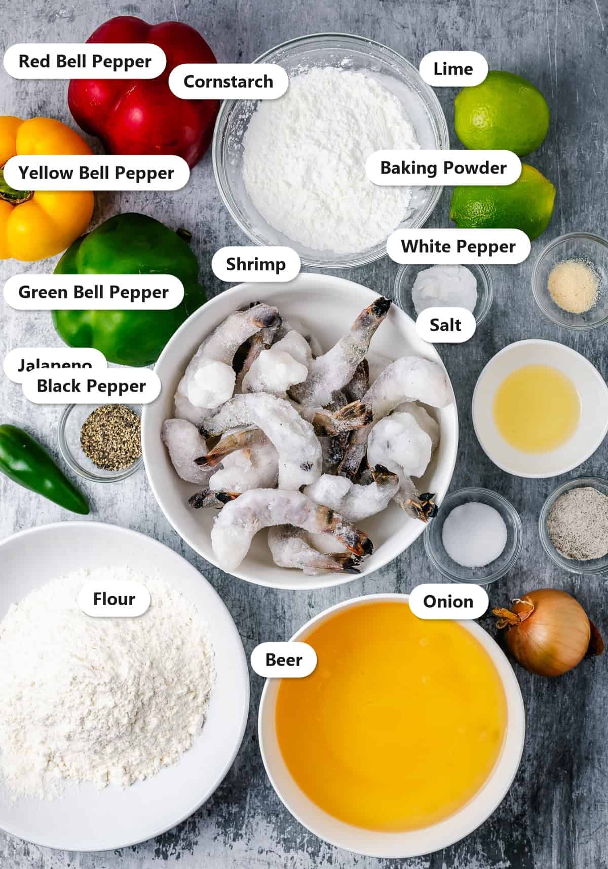 Labeled ingredients to make salt and pepper shrimp including shrimp, bell peppers, onion, jalapeno, beer, flour, and seasonings.