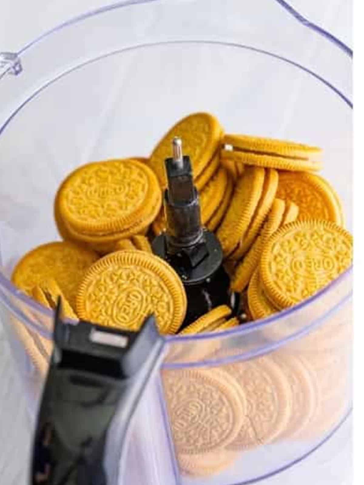 Golden Oreos in a food processor to make cookie crumbs for sand pudding.