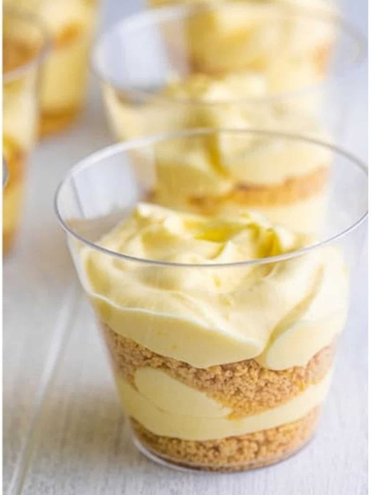 Sand pudding cups layered with cookie crumbs and pudding.