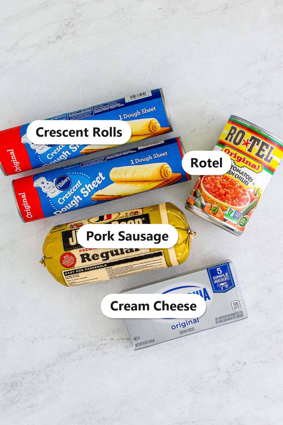 Labeled sausage pinwheels ingredients including pork sausage, cream cheese, Rotel, and crescent rolls.