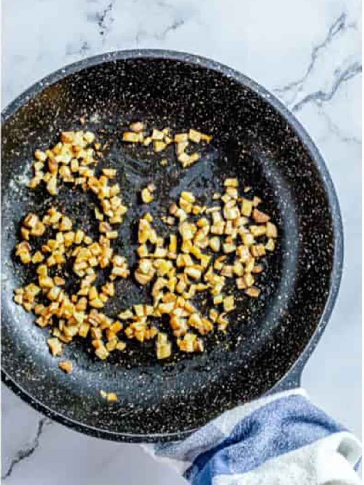 Chopped mushroom stems sauteed in butter in the skillet until softened.
