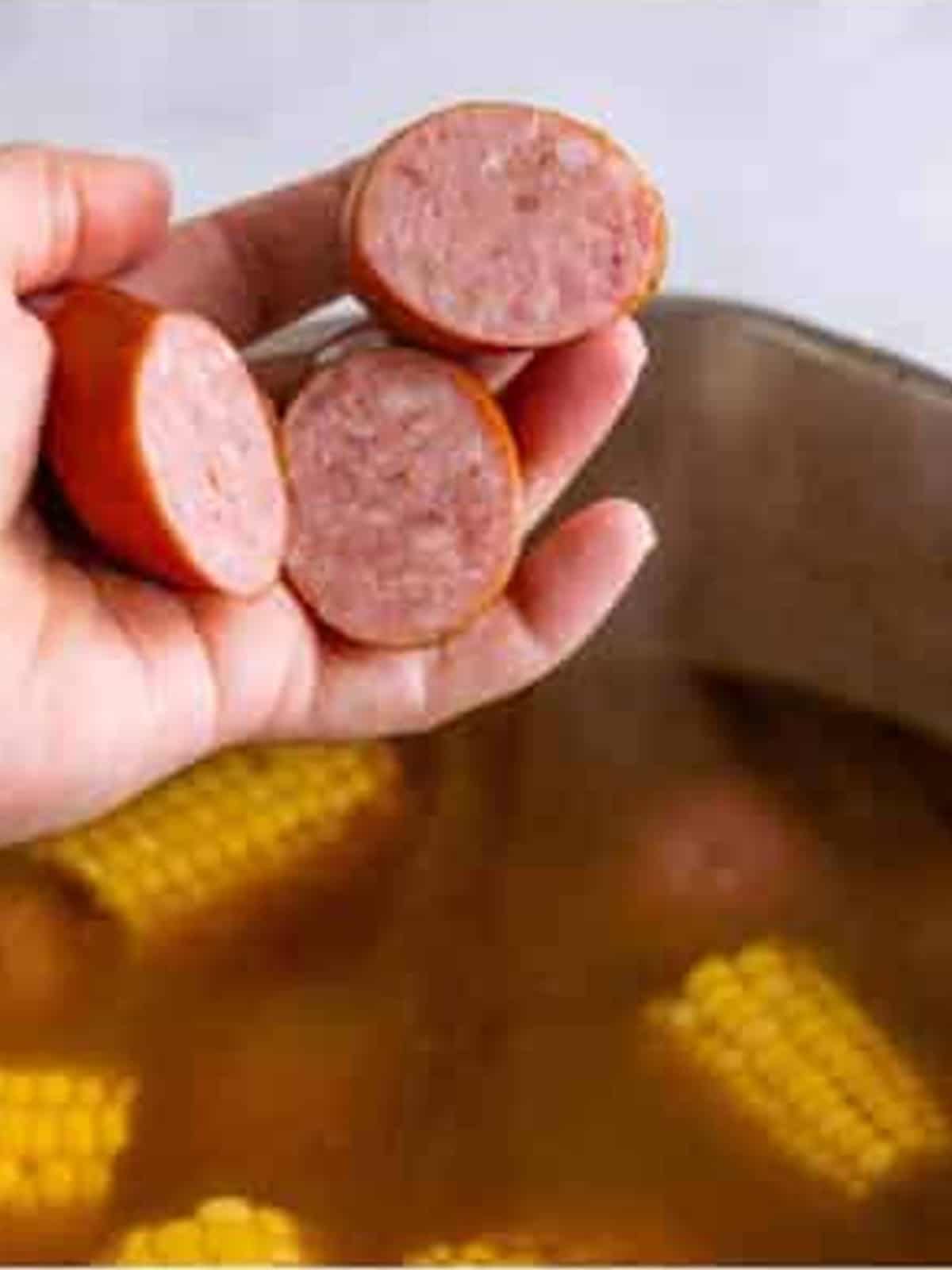 Sliced kielbasa added to the shrimp boil.