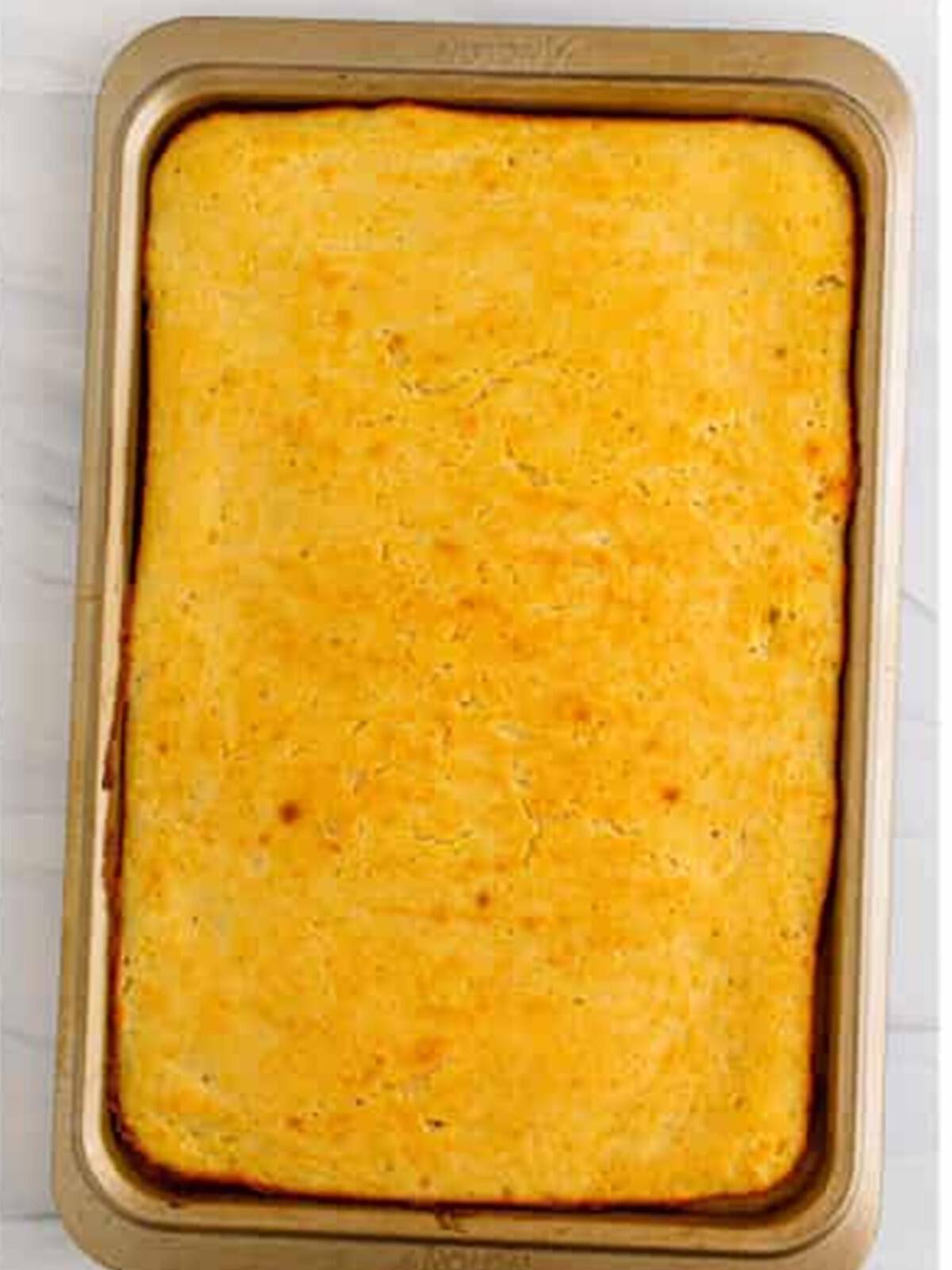 Golden baked sheet pan pancakes fresh from the oven.