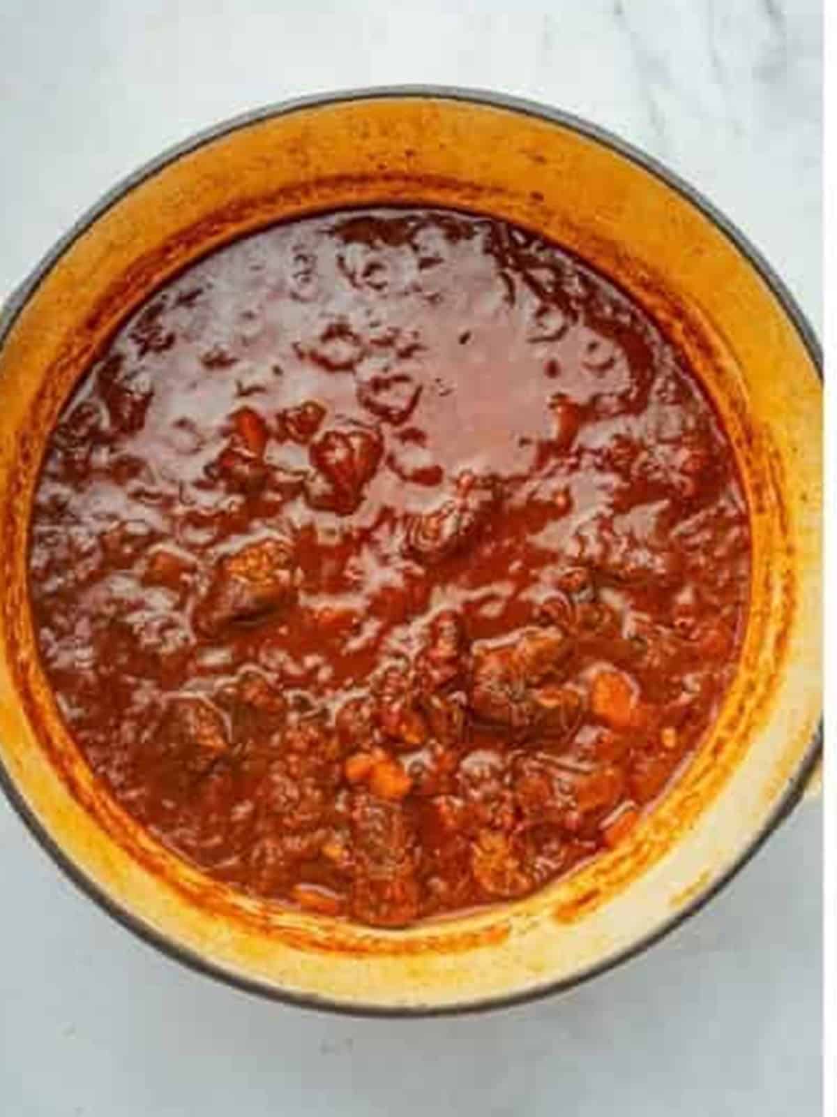 Short rib ragu sauce simmered low and slow until thick and rich.