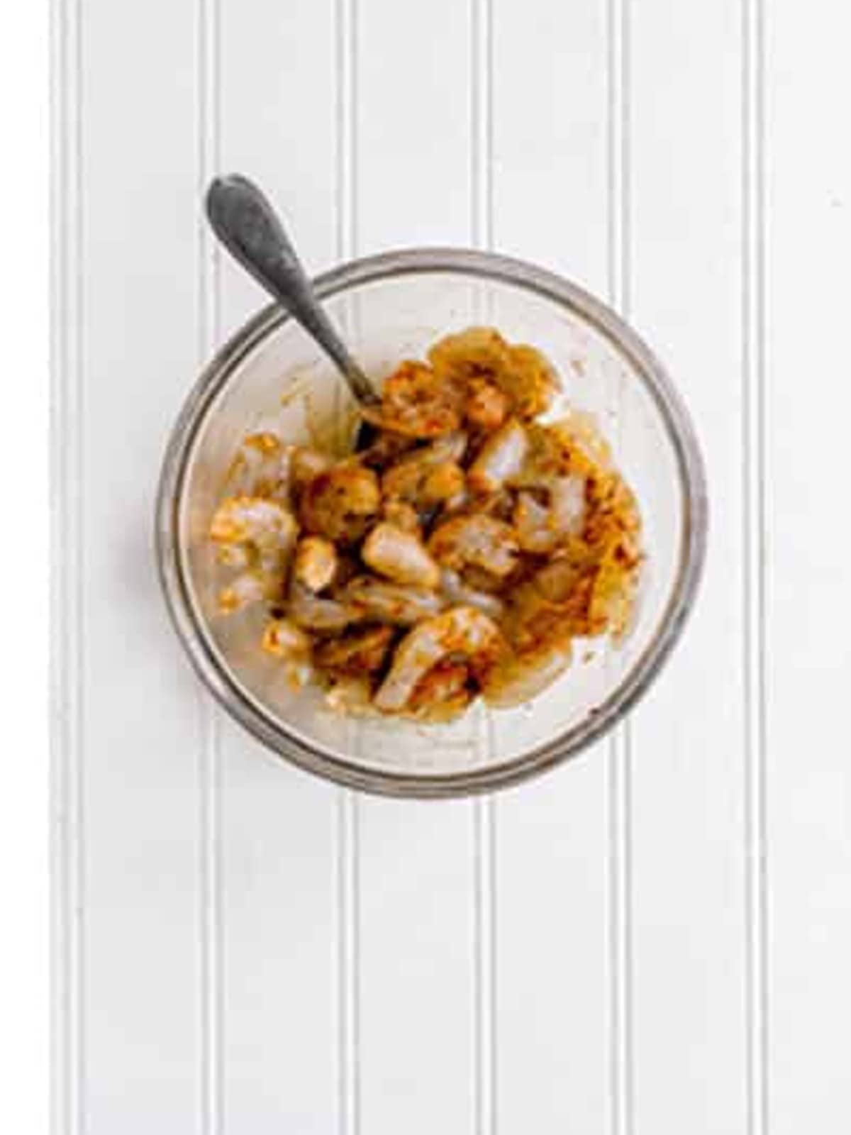 Cooked seasoned shrimp in a bowl for shrimp tacos.