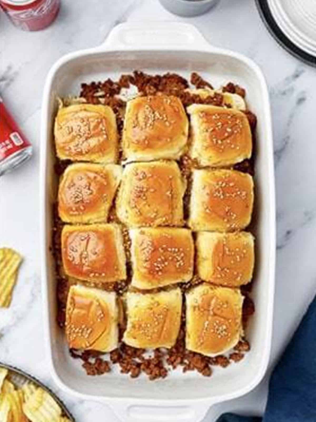 Golden baked sloppy joe sliders fresh from the oven.