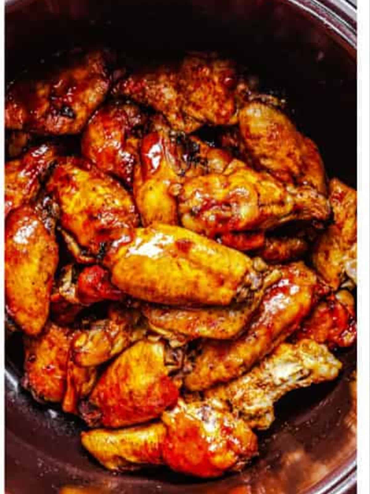 Caramelized sticky slow cooker BBQ chicken wings.