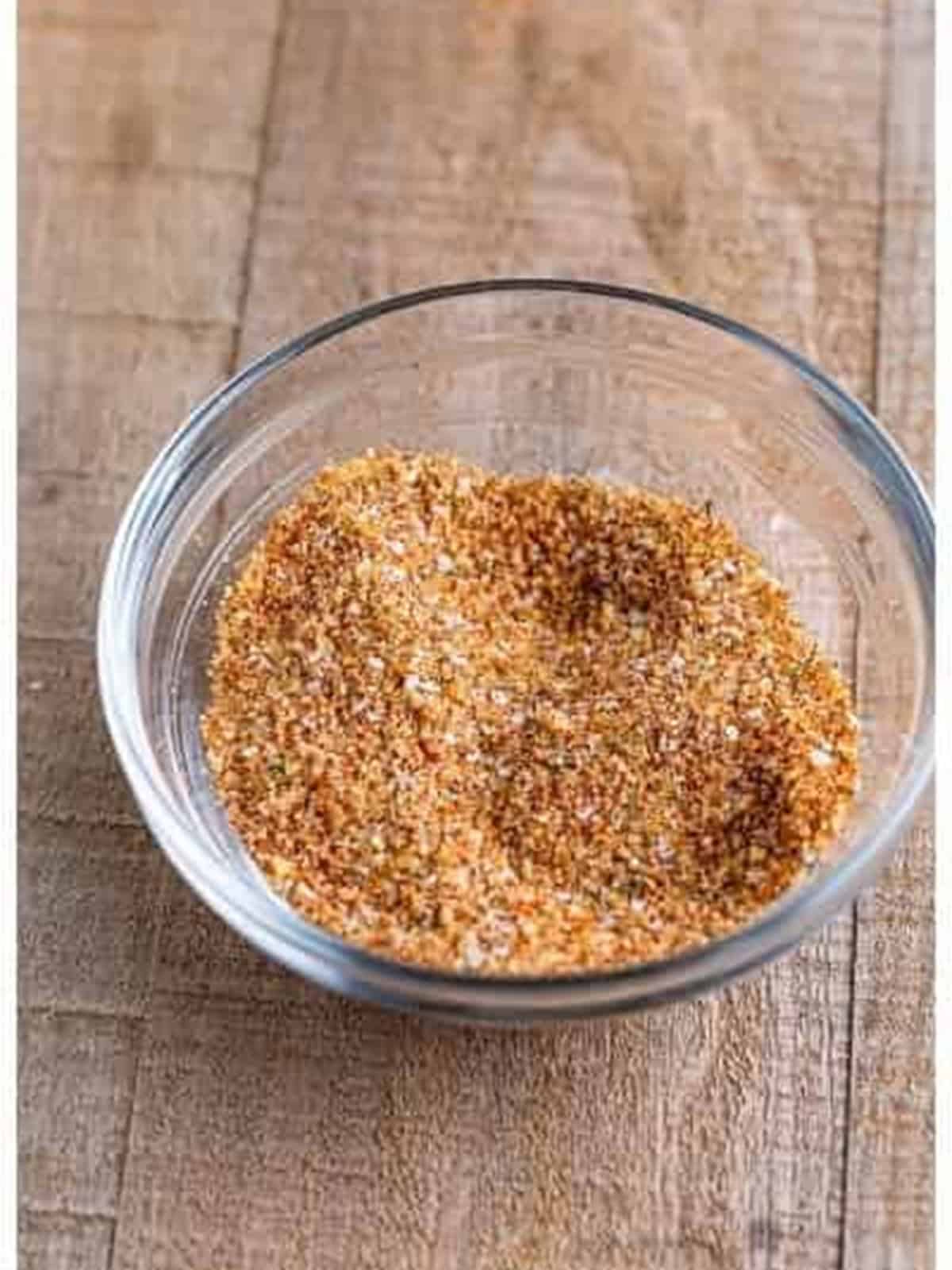 Mixed dry rub for smoked chicken legs.