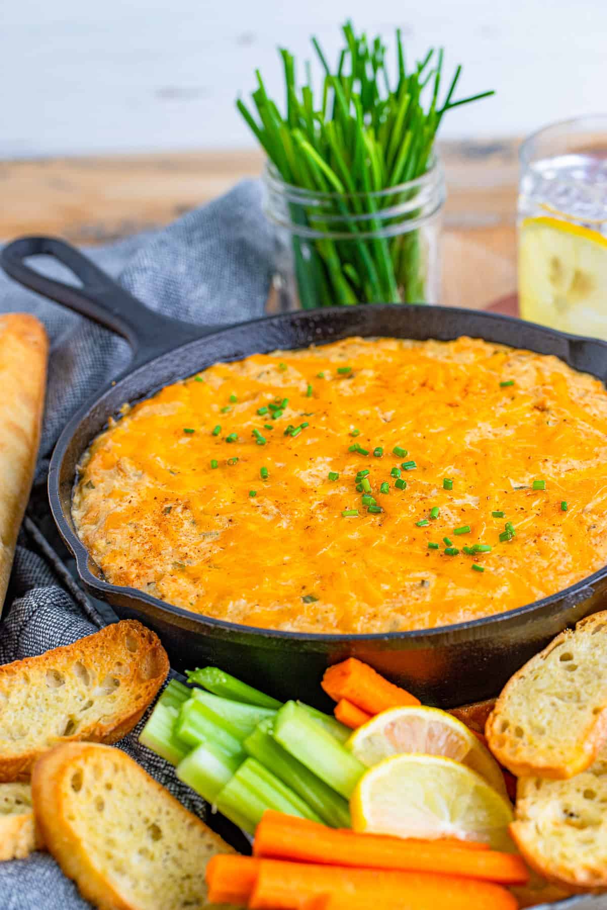 Smoked crab dip served warm with crackers and fresh dippers.