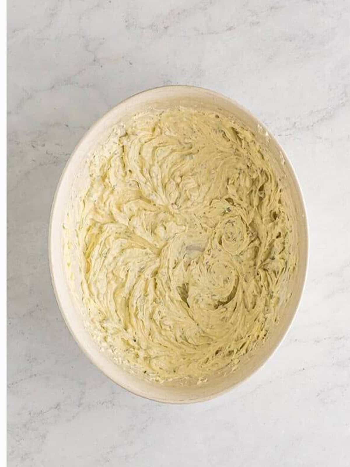 Dill, chives, capers, and red onion mixed into the creamy smoked salmon dip base.