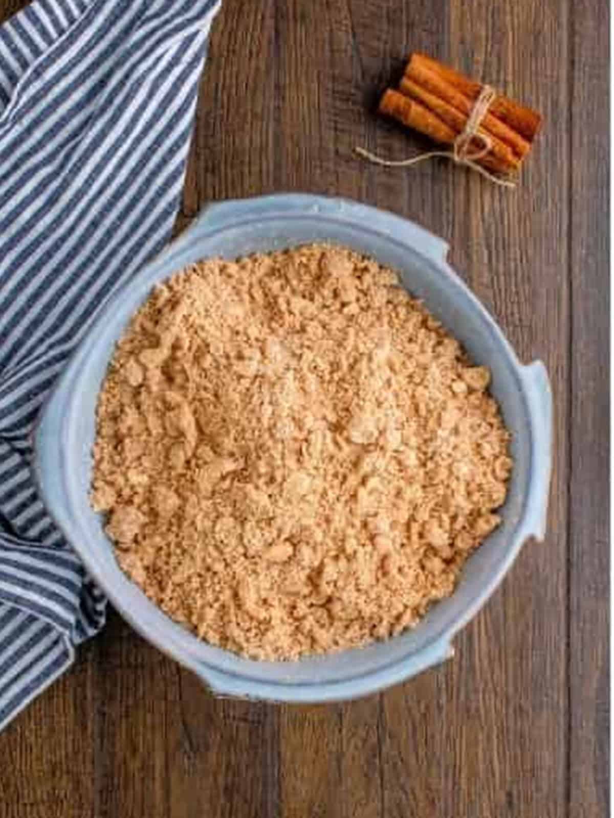 Cinnamon brown sugar crumble topping for sour cream coffee cake mixed in a bowl.