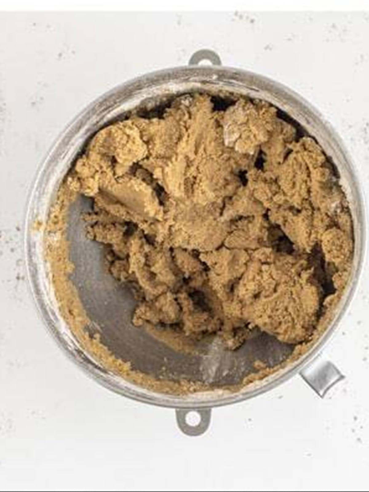 Spice cookie dough mixed in a stand mixer bowl.