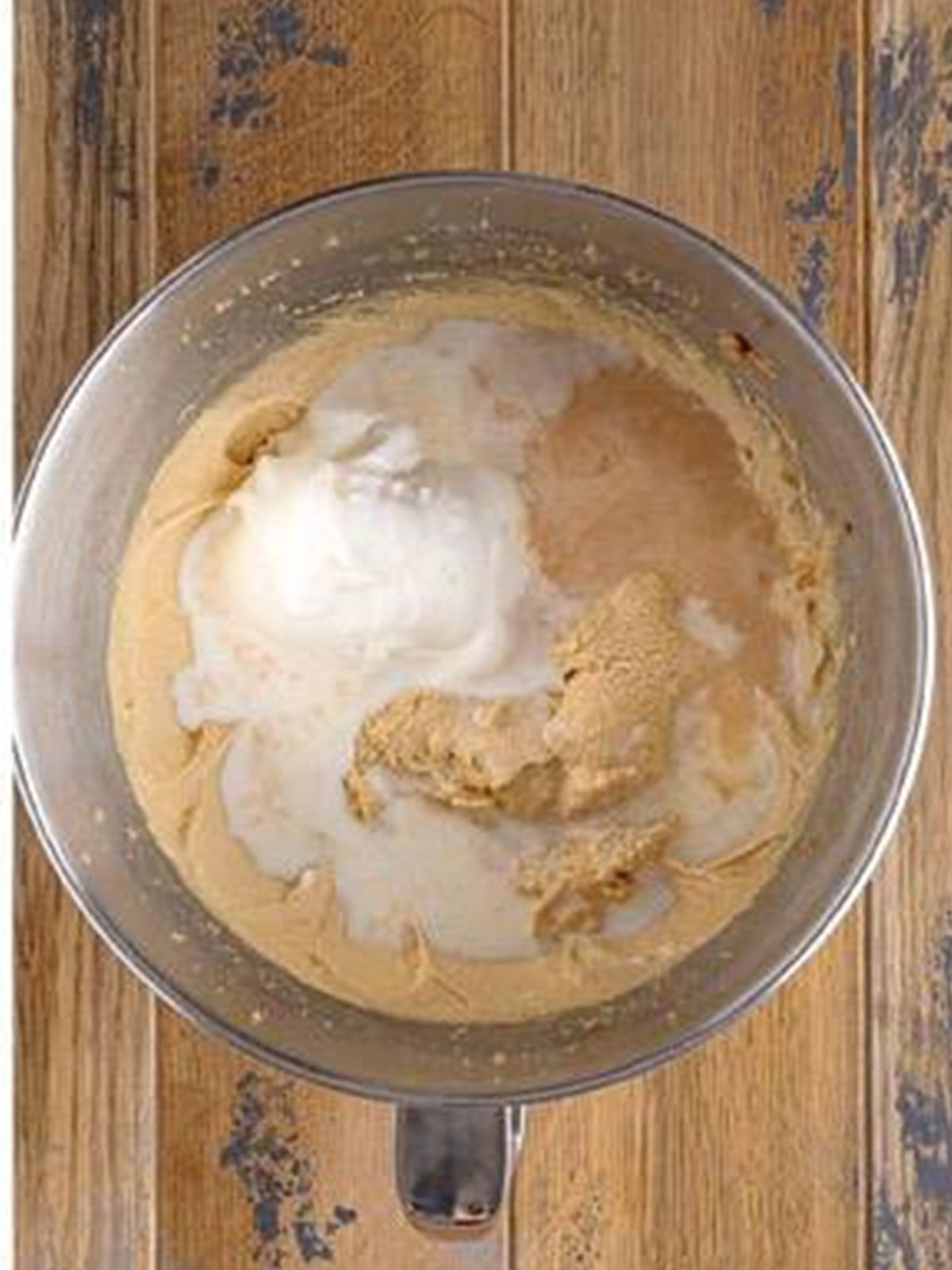 Sour cream, milk, and vanilla added to the cupcake batter.