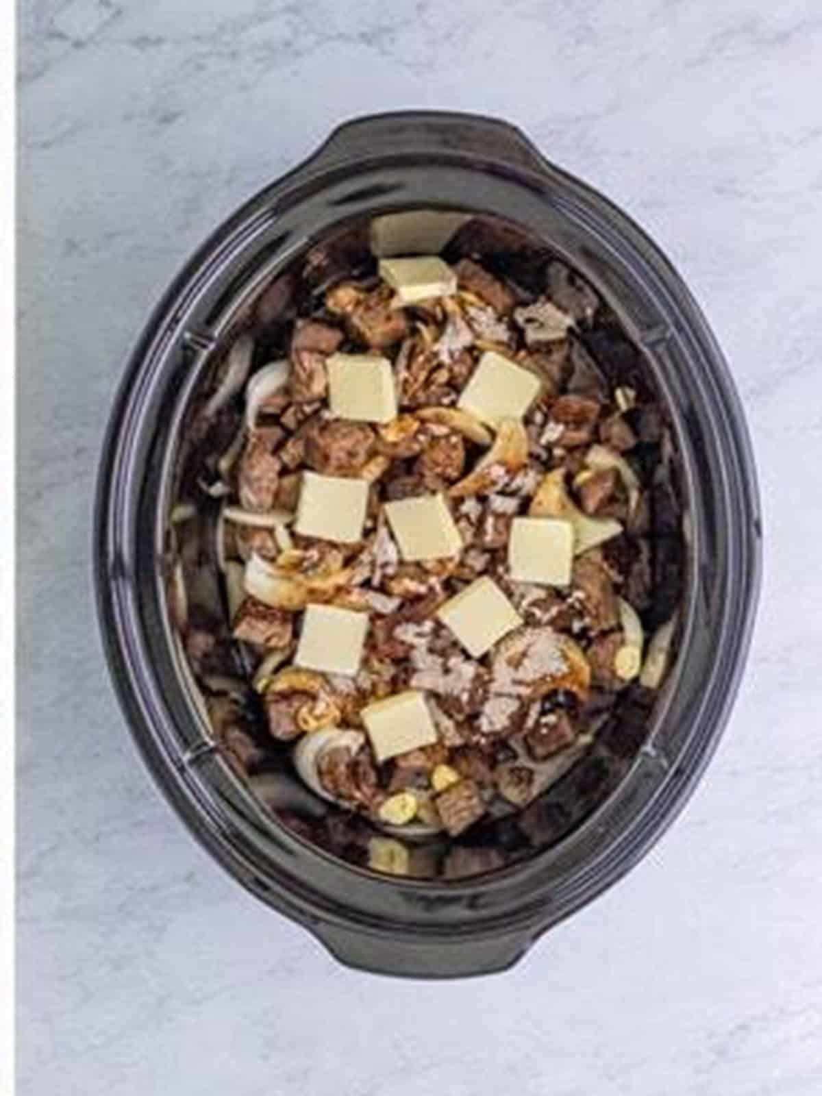 Au jus mix and butter added over the steak bites.