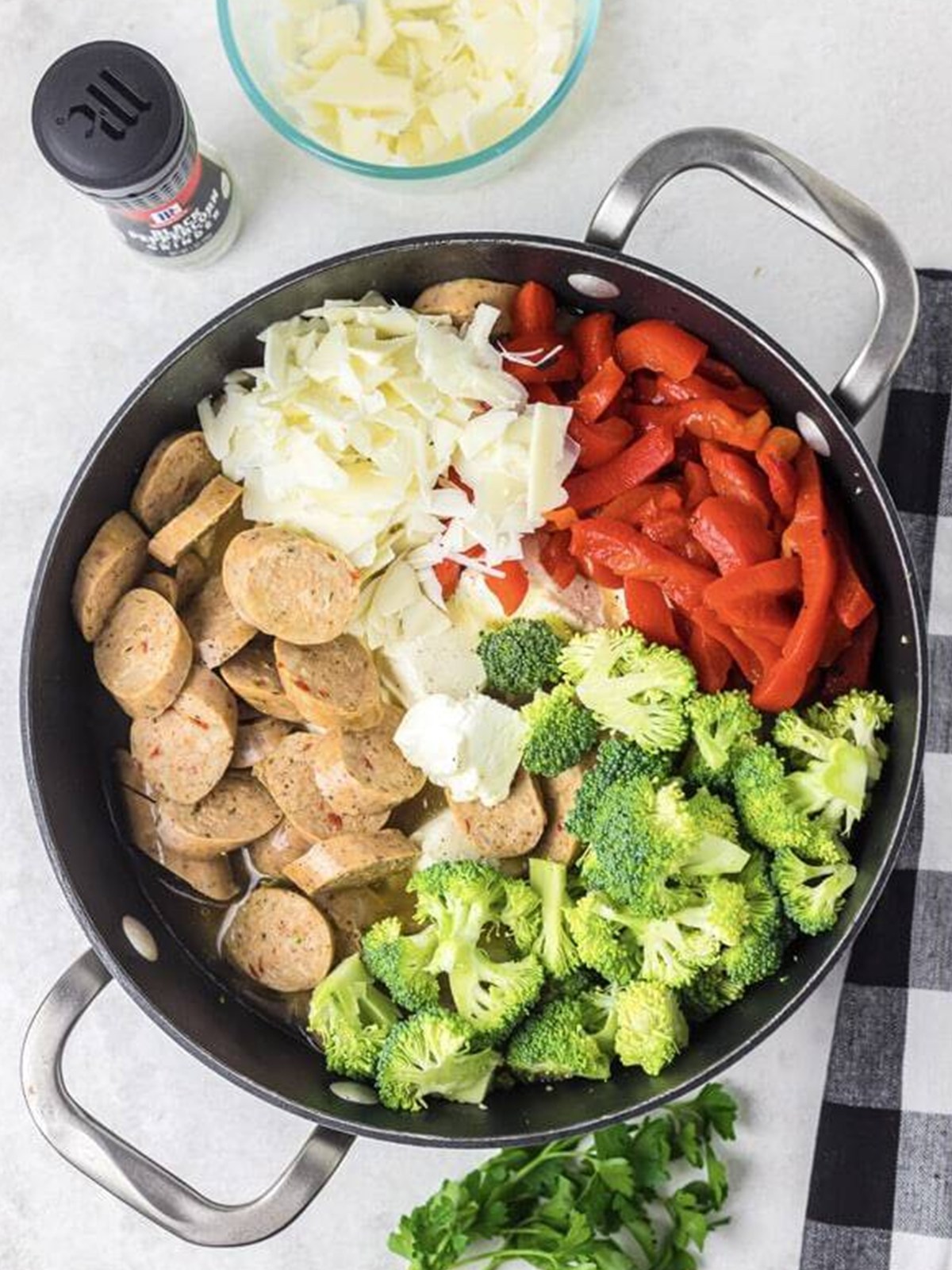 Chicken sausage, broccoli, red peppers, and cheeses added to the pasta.