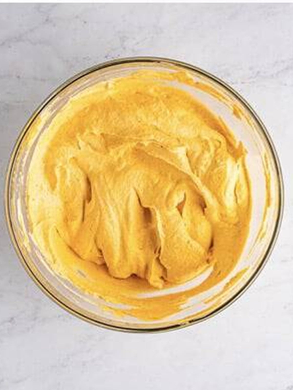 Fully combined no bake pumpkin cheesecake filling with no streaks.