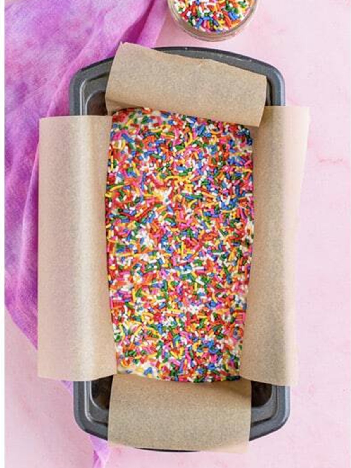 More sprinkles added on top of the ice cream bread batter before baking.