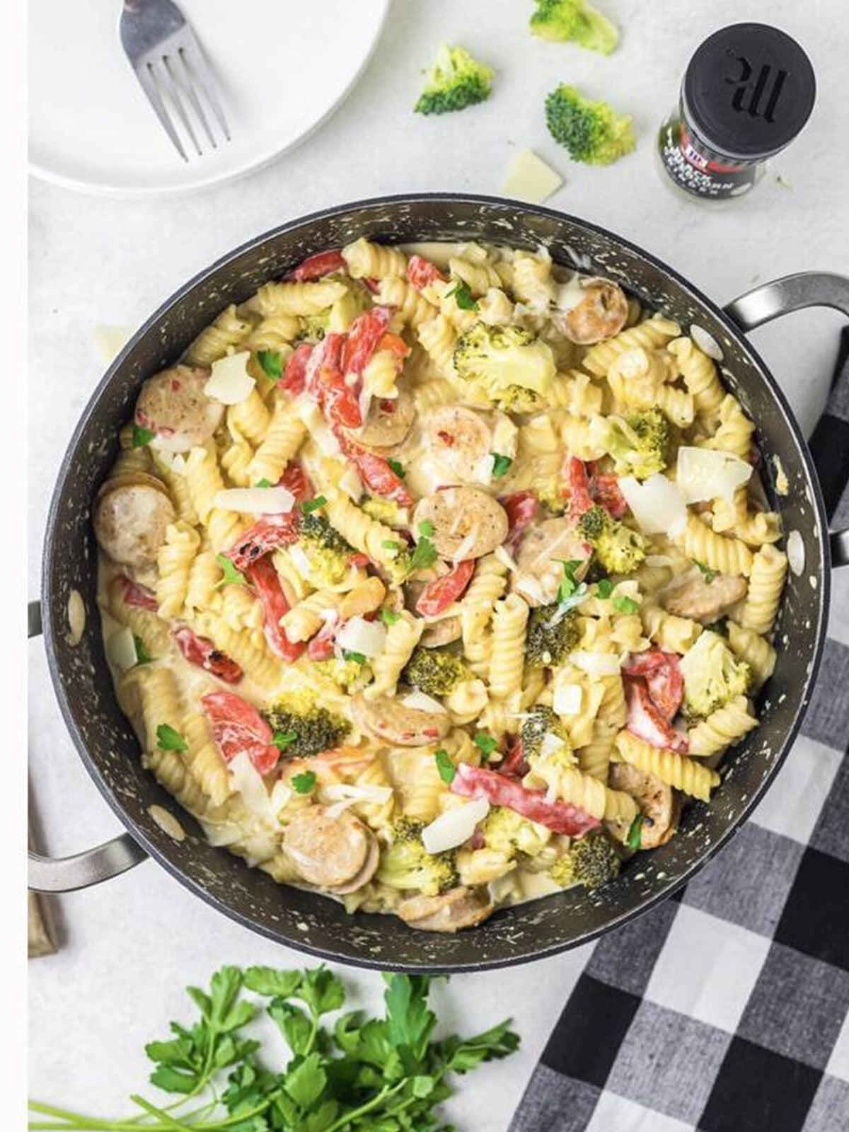 Creamy chicken broccoli pasta simmered together in the skillet.