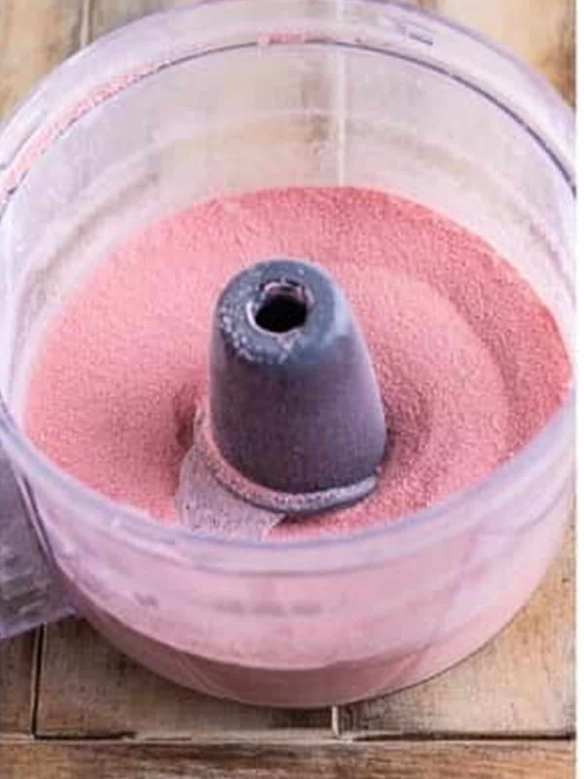 Sugar and strawberry jello blended into a fine pink sugar.