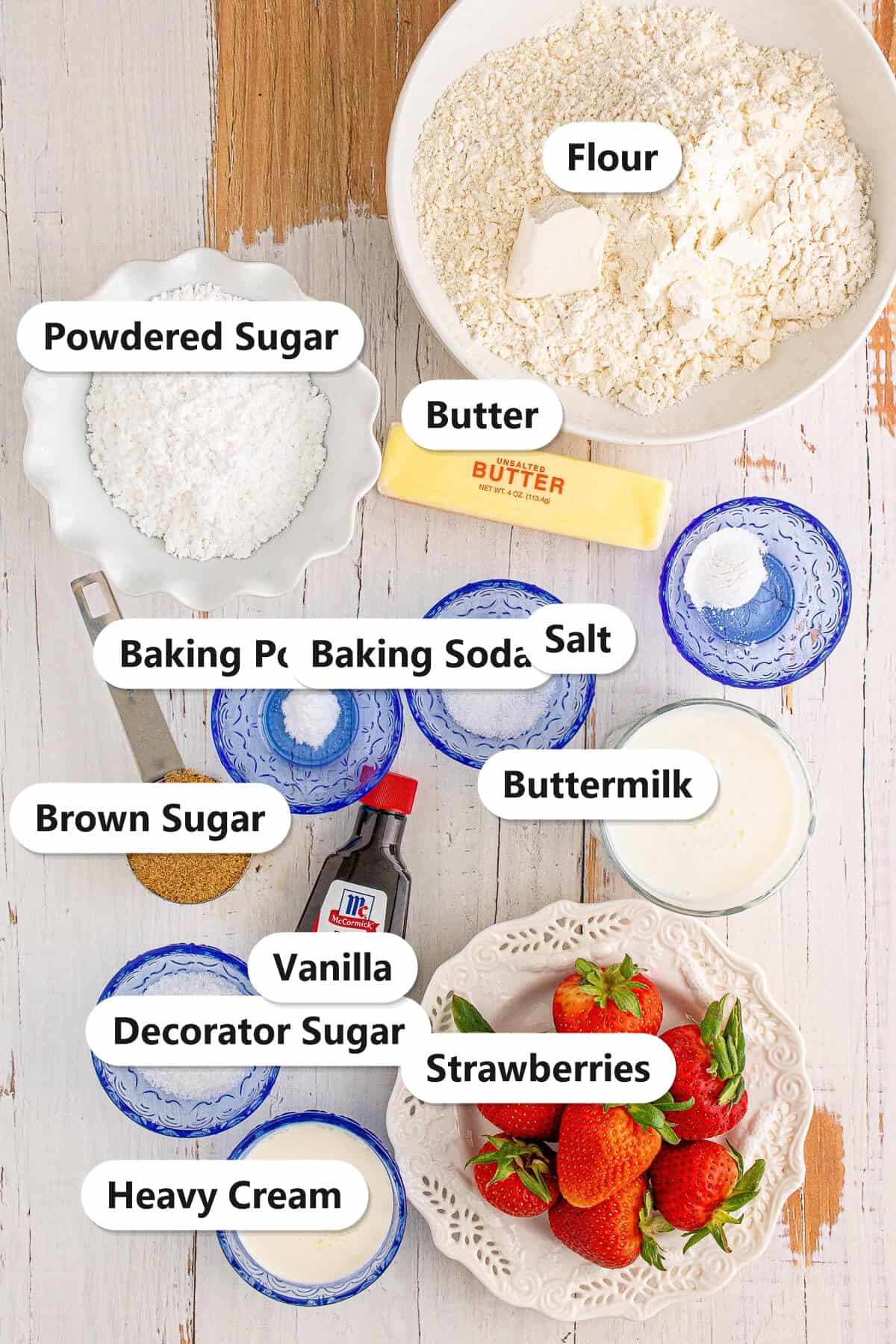 Labeled ingredients to make fresh strawberry scones.