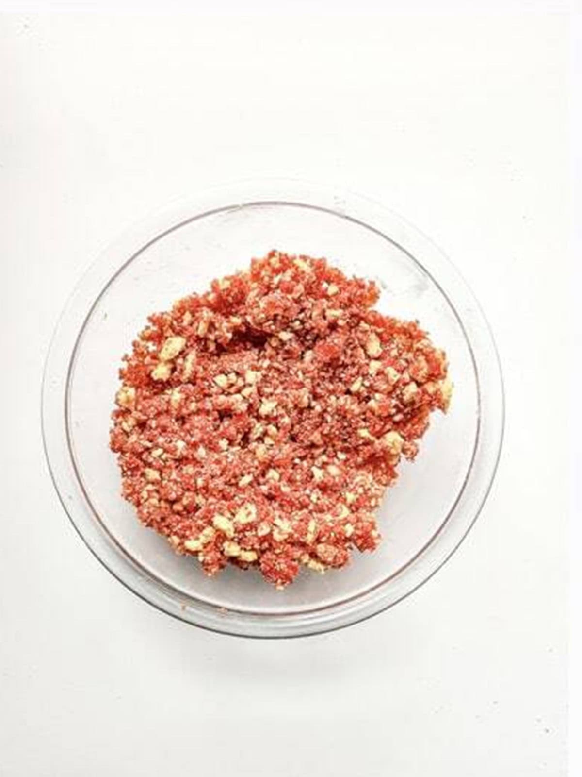Strawberry crunch topping made from golden Oreo crumbs and strawberry jello.