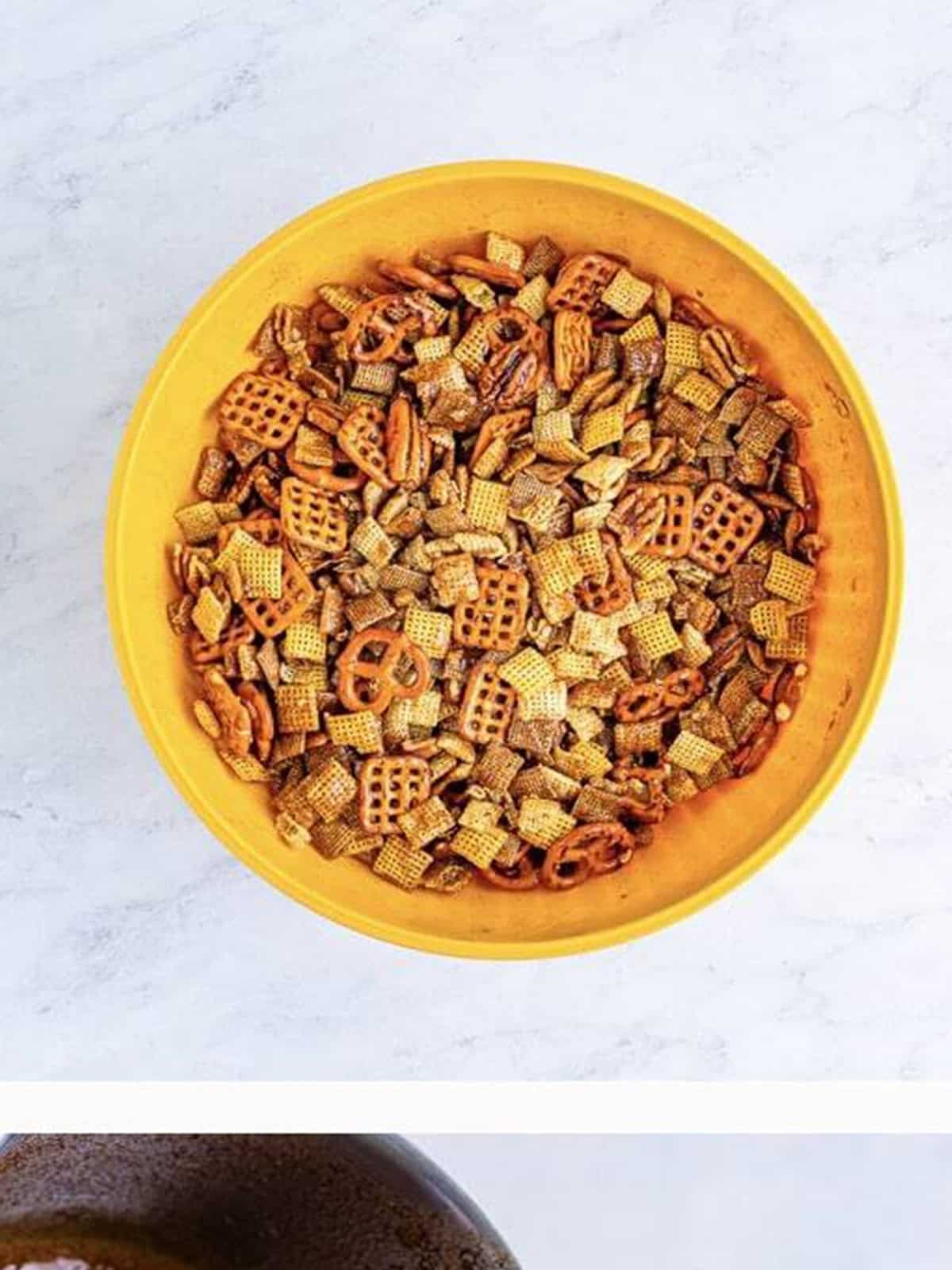 Rice, corn, and wheat Chex with pretzels and pecans combined in a large bowl for Sweet Chex Mix.