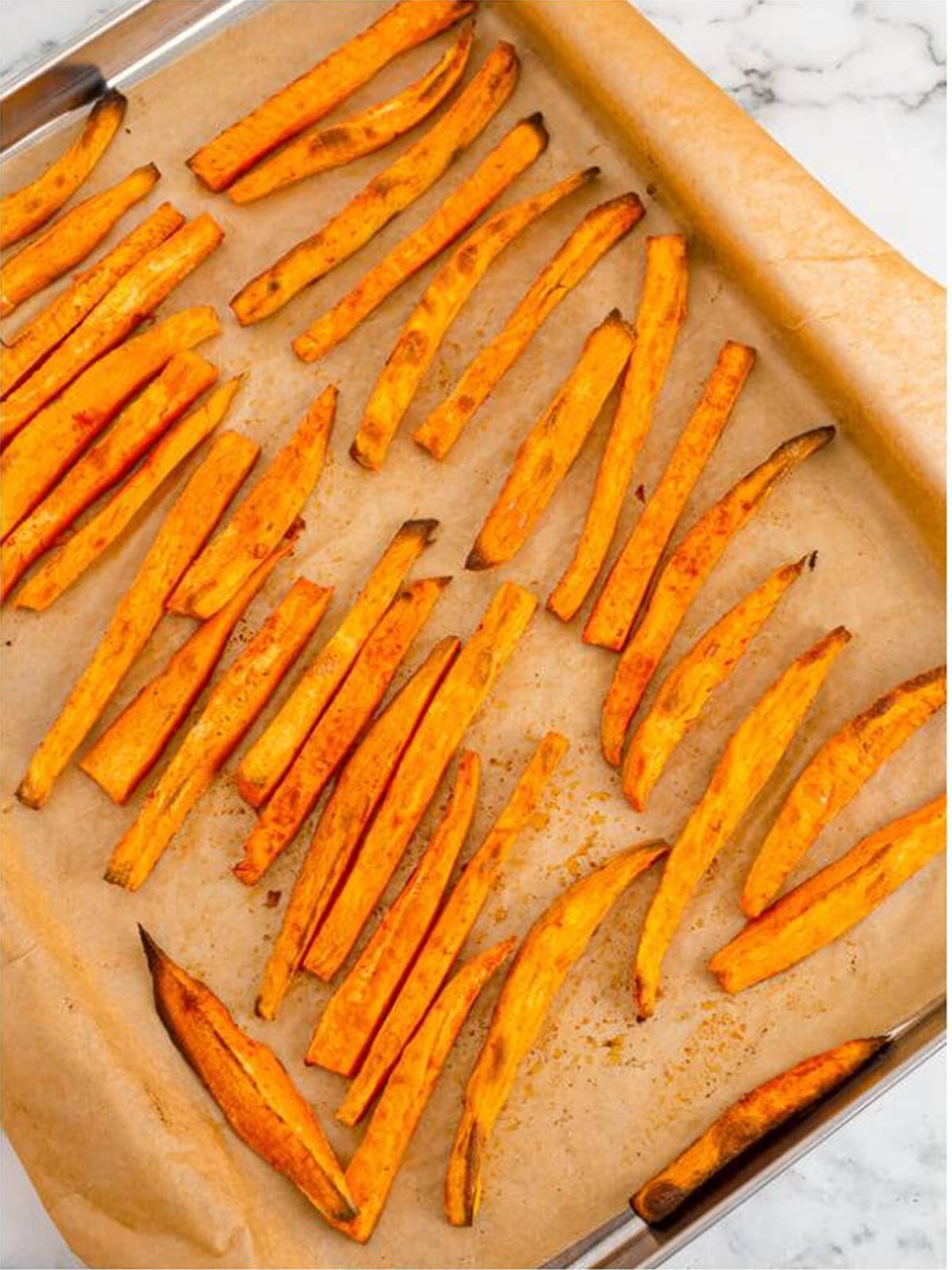 Crispy baked sweet potato fries fresh from the oven