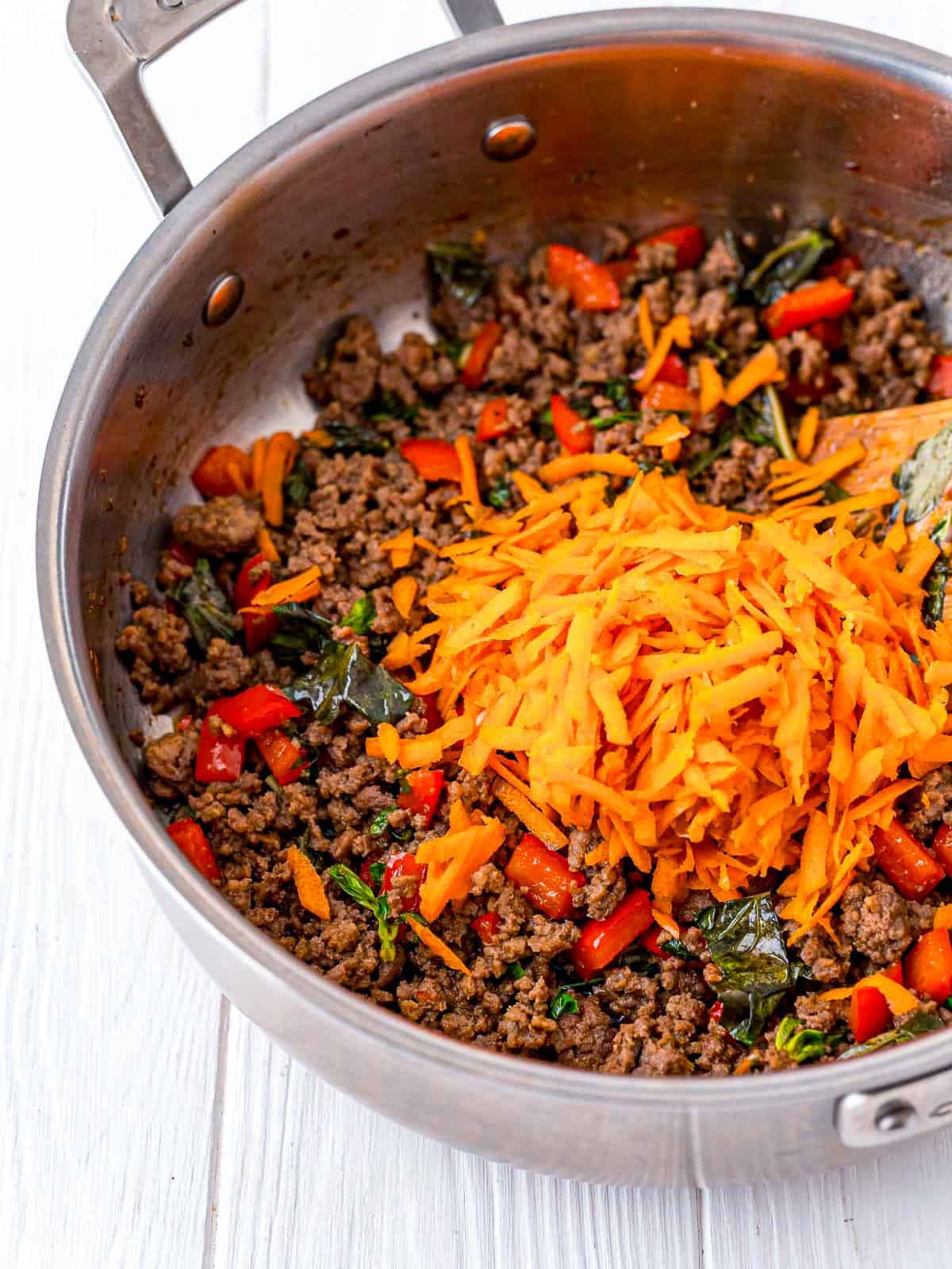 Grated carrot folded into the finished Thai beef.