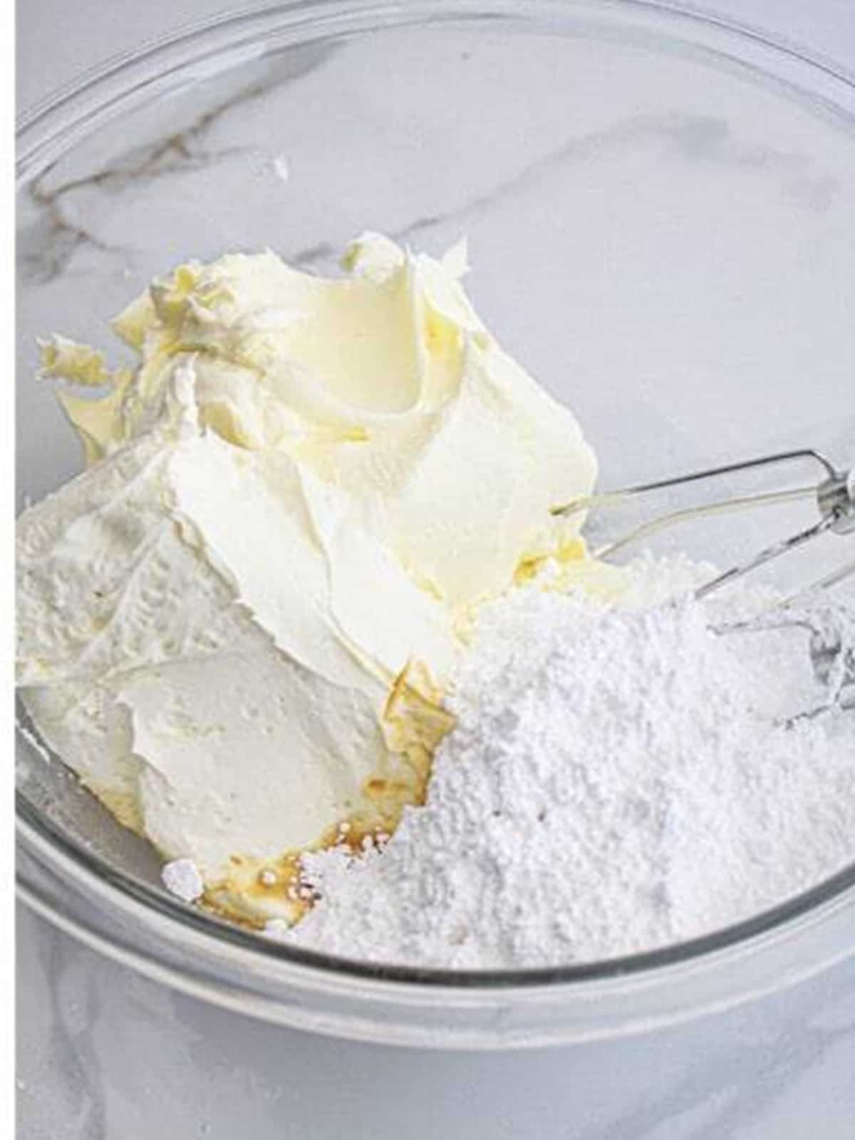 Mascarpone, cream cheese, and powdered sugar beaten into a smooth cheesecake filling.
