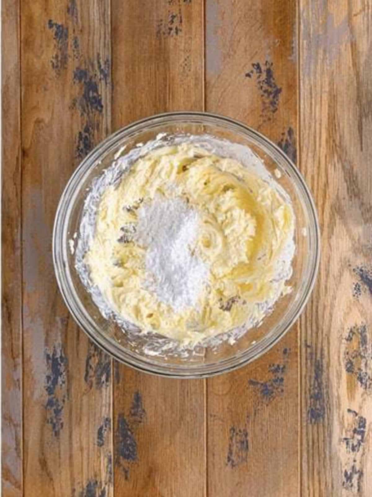 Powdered sugar added to the whipped mascarpone and cream cheese.