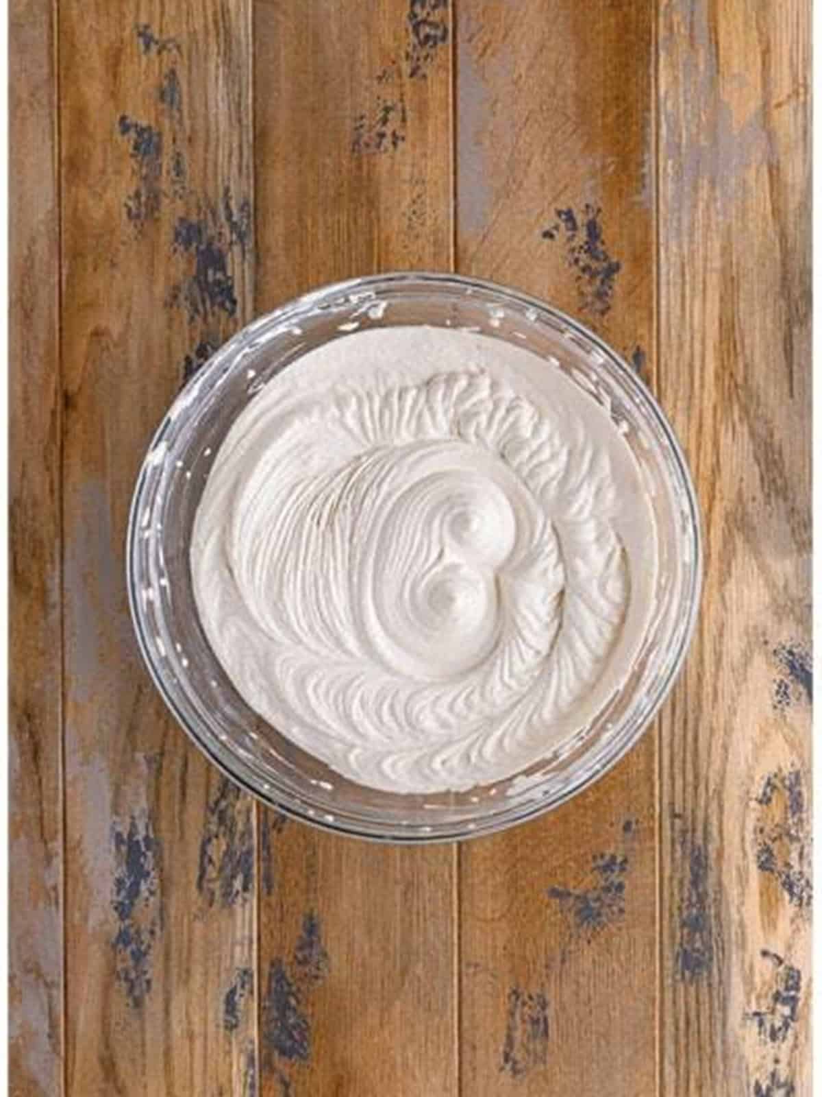 Smooth and fluffy tiramisu dip whipped together in a bowl.