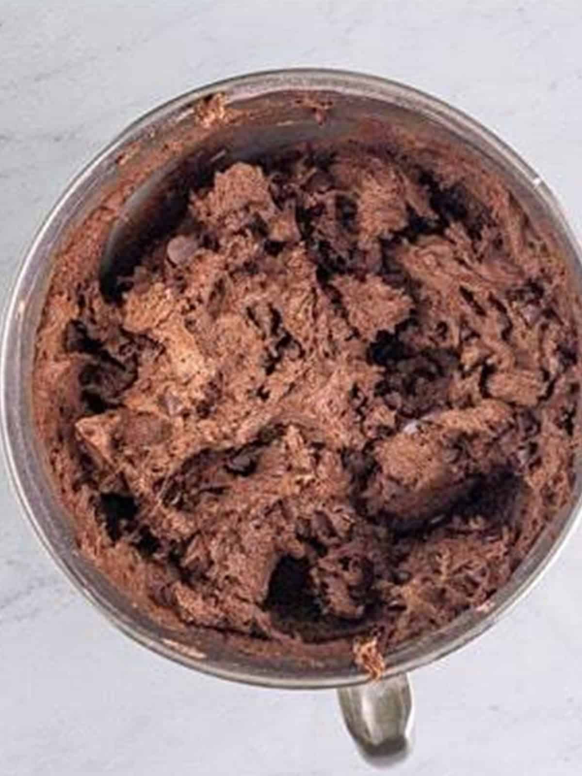 Eggs, the cocoa flour mixture, and semi sweet chocolate chips mixed into the cookie dough.